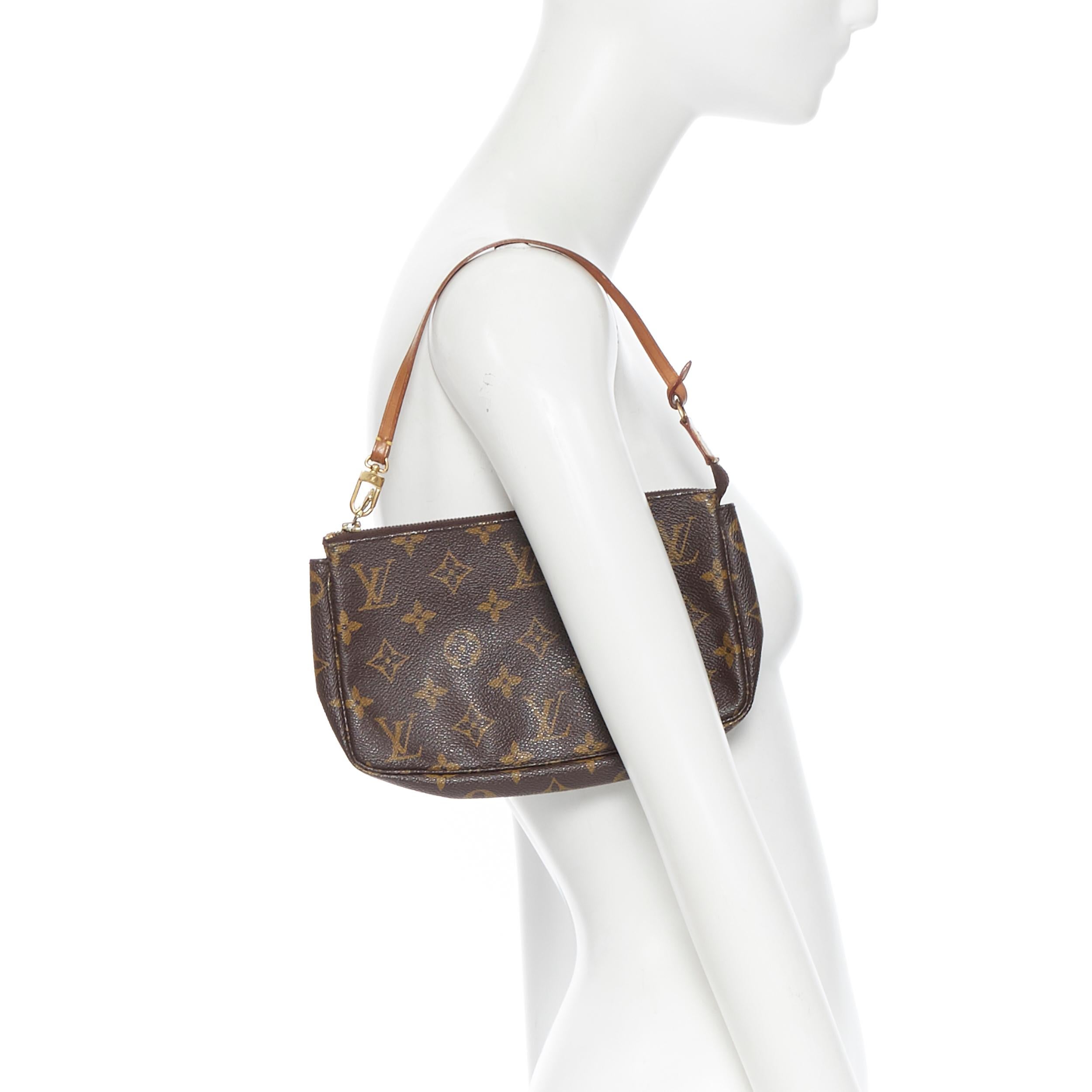 vintage LOUIS VUITTON monogram logo canvas leather trimmed top zip pouch bag 
Brand: Louis Vuitton
Designer: Louis Vuitton
Model Name / Style: Top zip pouch
Material: Other; coated canvas
Color: Brown
Pattern: Other
Closure: Zip
Extra Detail: Code: