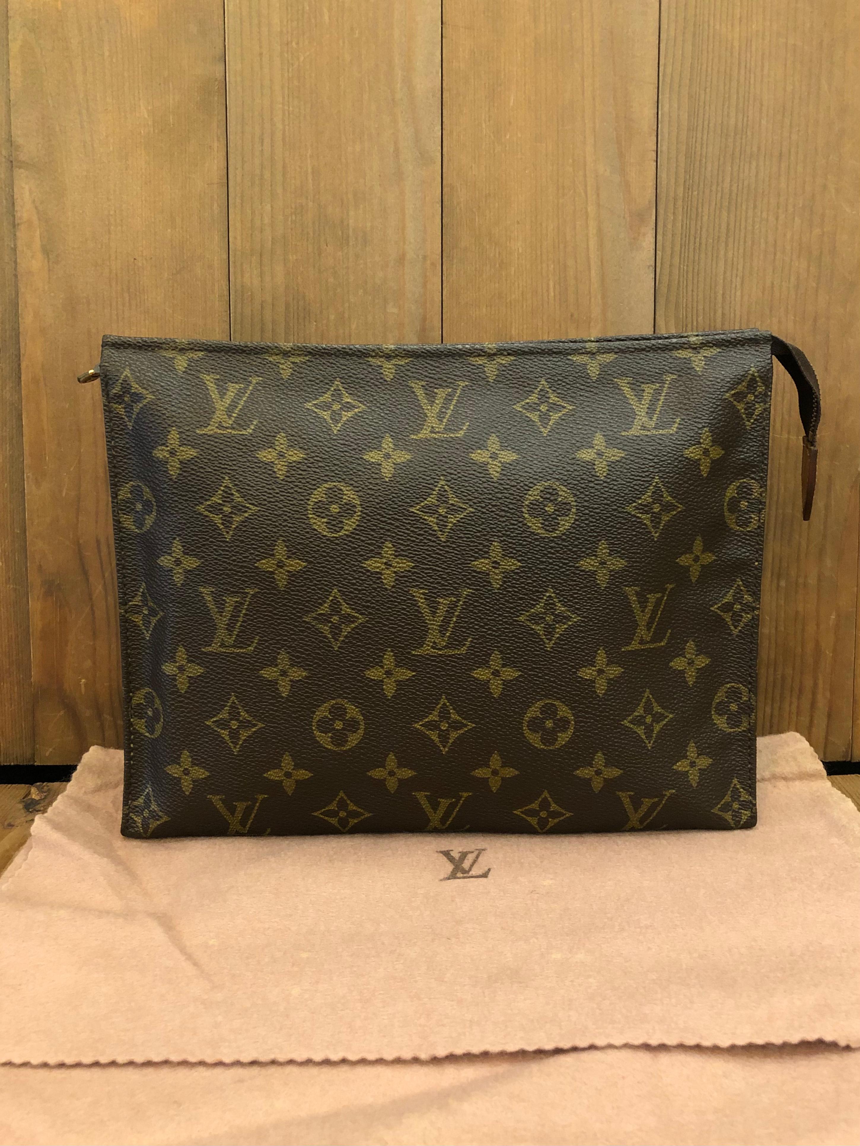 This vintage Louis Vuitton toiletry pouch is crafted of Louis Vuitton monogram toile canvas. Top zipper closure opens to an textured interior in ivory. This pouch is ideal for traveling and can even be used as a chic clutch for your essentials for