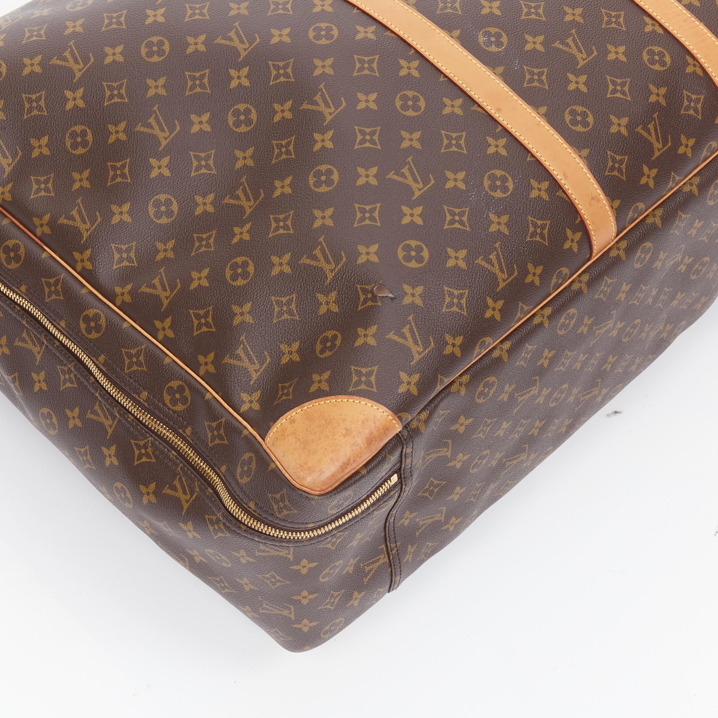 Women's vintage LOUIS VUITTON Monogram Sirius 70 coated canvas LV rolled handle luggage