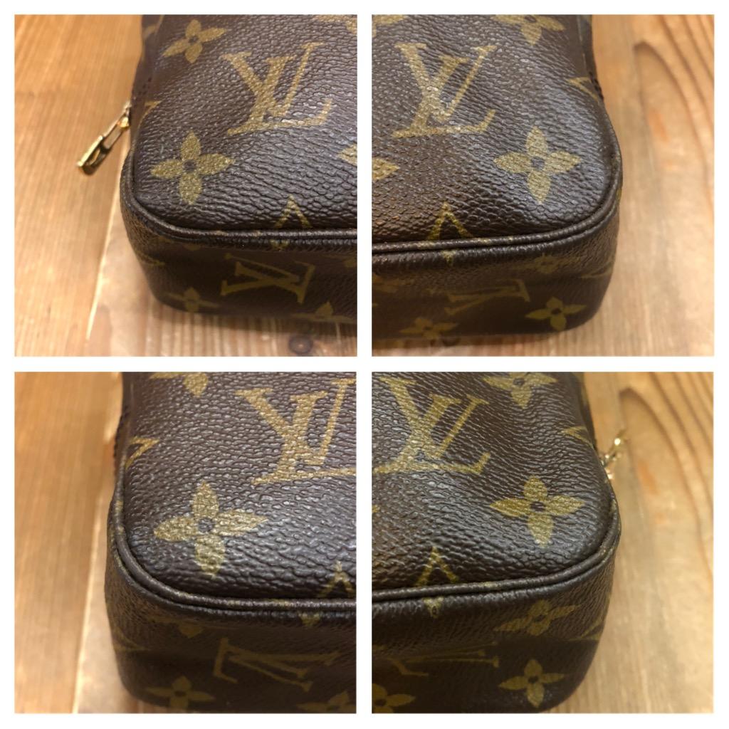 This vintage Louis Vuitton cosmetic pouch is crafted of Louis Vuitton coated monogram canvas. The zip around feature lets you open the pouch wide to fit in your make-up or toiletry essentials. This is the ideal pouch for traveling or simply the