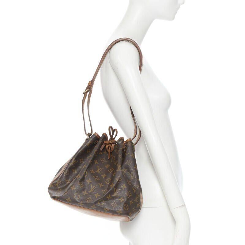 vintage LOUIS VUITTON Petite Noe brown monogram canvas drawstring bucket bag
Reference: WEWN/A00006
Brand: Louis Vuitton
Model: Noe
Material: Others, Canvas
Color: Brown
Pattern: Other
Closure: Drawstring
Extra Details: Adjustable shoulder