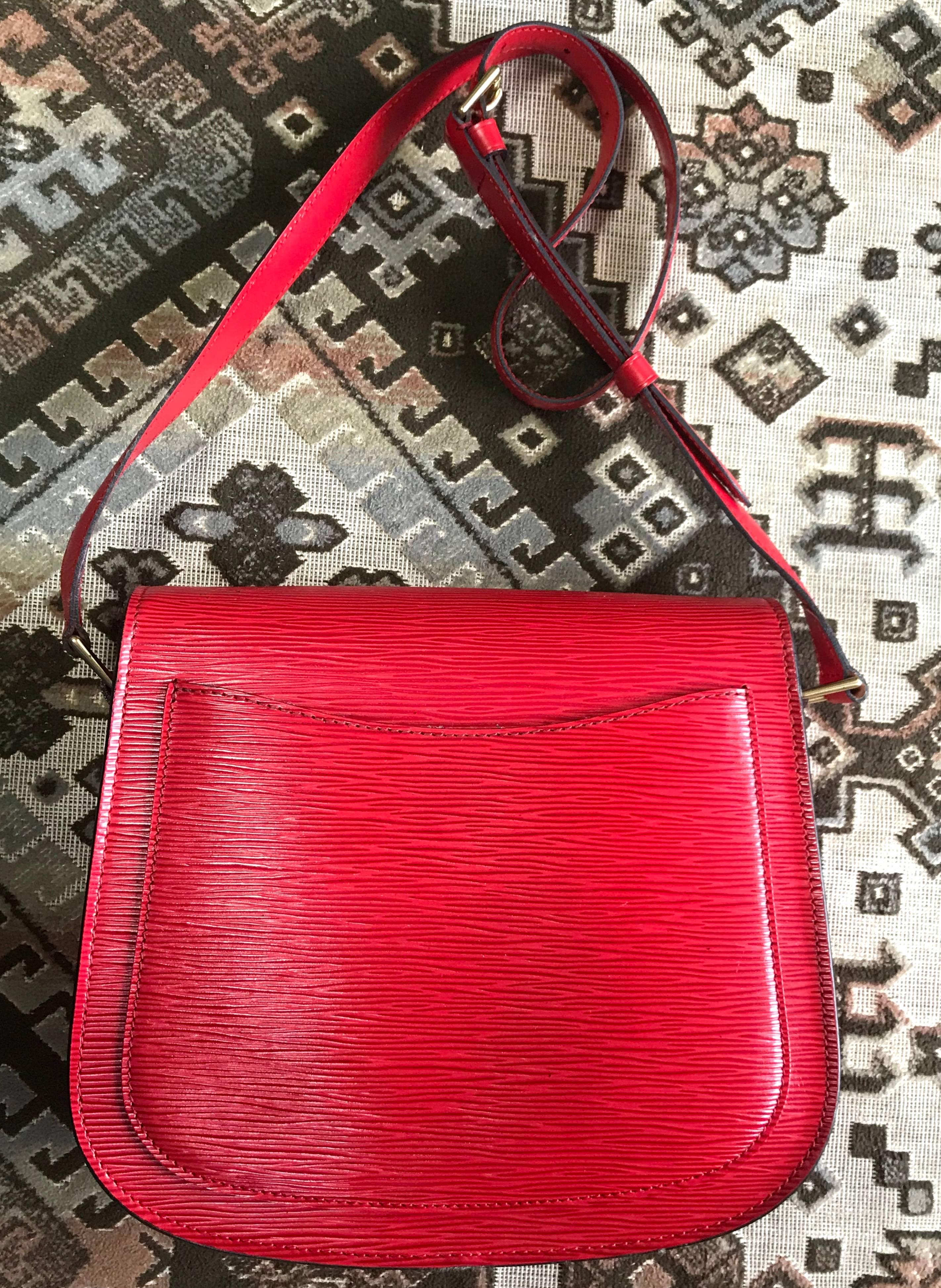Red Vintage Louis Vuitton red epi leather shoulder bag. Classic purse. Beautiful.