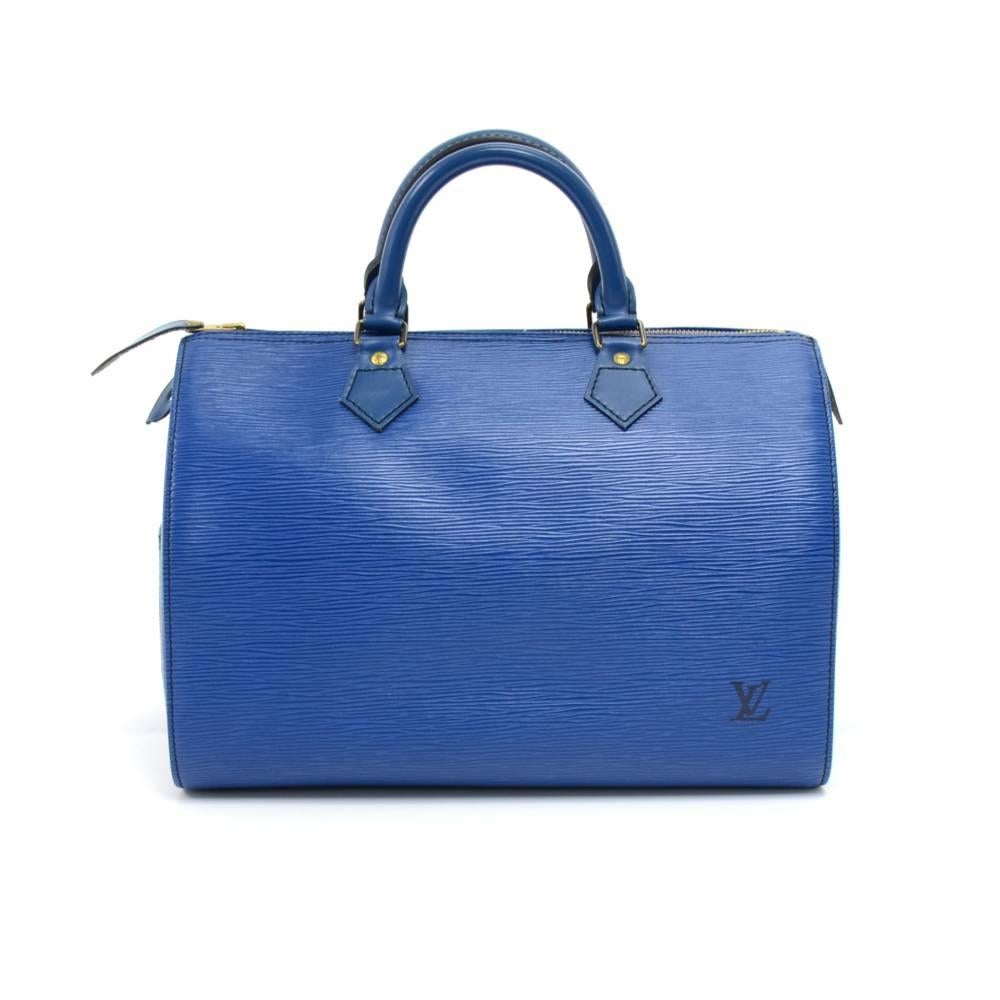 Vintage Louis Vuitton Speedy 30 bag in blue epi leather. Offers lightweight elegance in a compact format. Inspired by the famous keep all travel bag, it has zip closure. Wonderful classic one of the most popular shapes from Louis Vuitton. SKU: