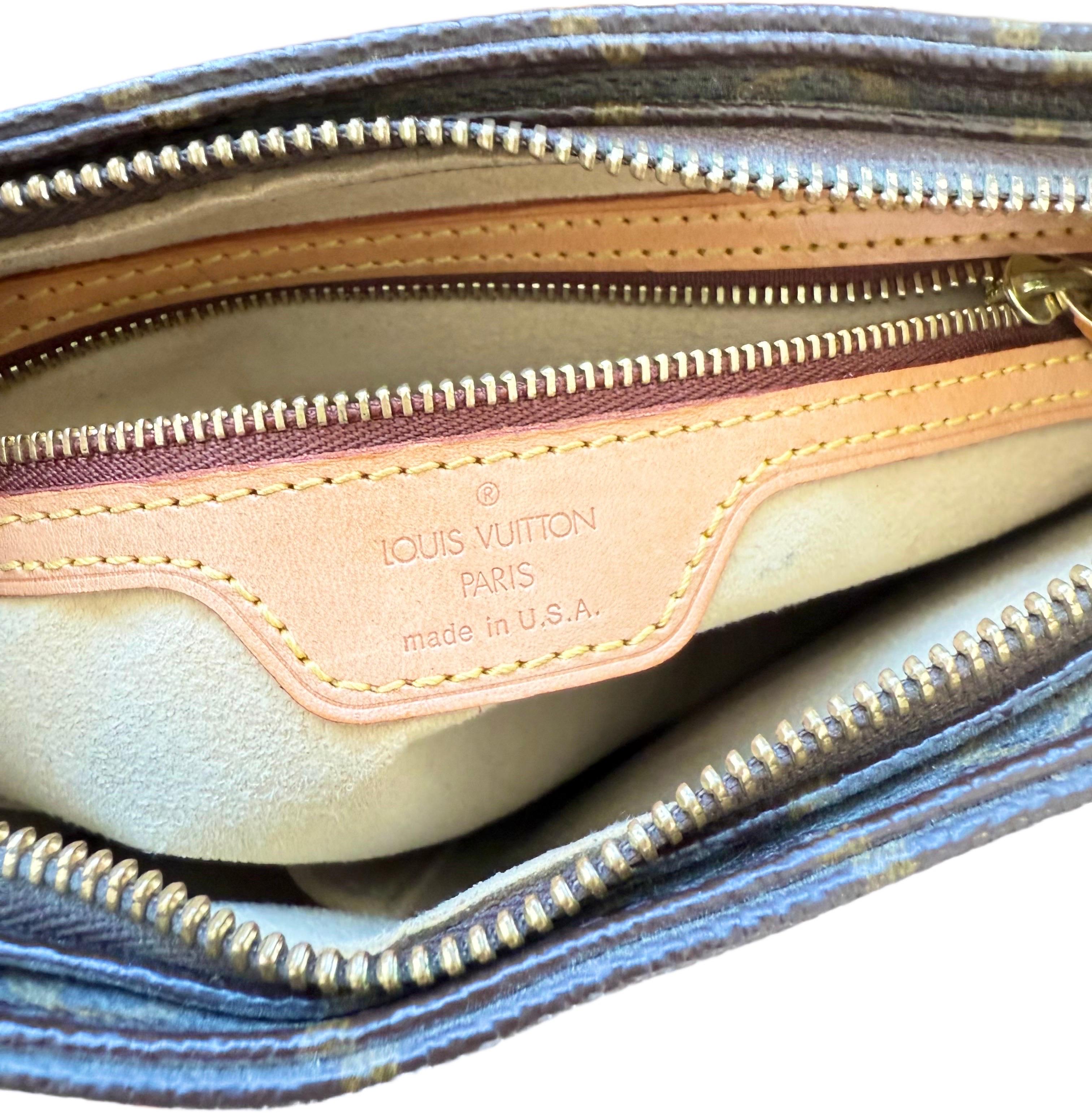 A timeless icon of early 2000s authentic Louis Vuitton design, this super rare Louis Vuitton Looping PM Shoulder Bag embodies the effortless sophistication of the Y2K era. Discontinued in 2004, this is a very sought out bag. Crafted from the brand’s