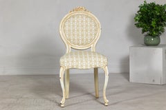 Vintage Louis XV-Style Side Chair with Floral Carving and Patterned Fabric