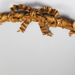 Specchio da parete in legno dorato italiano in stile Luigi XVI con cesto floreale