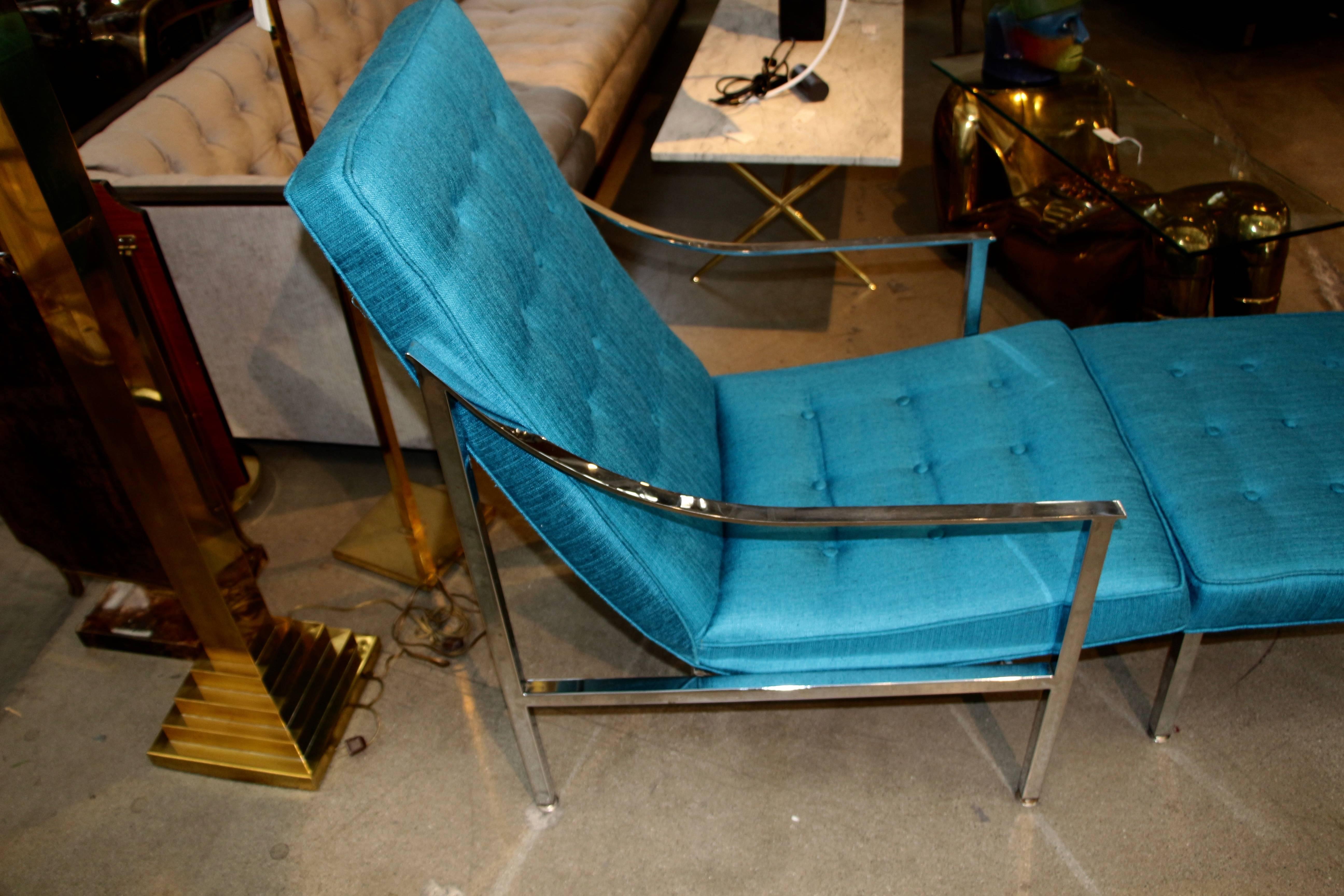 A nice chrome and turquoise lounge chair and ottoman. The chair and ottoman have been re-upholstered. The chrome has some minor marks appropriate with to its age. Ottoman measures approximate 23” W, 19” D and approximate 15.5 inches tall. Chair