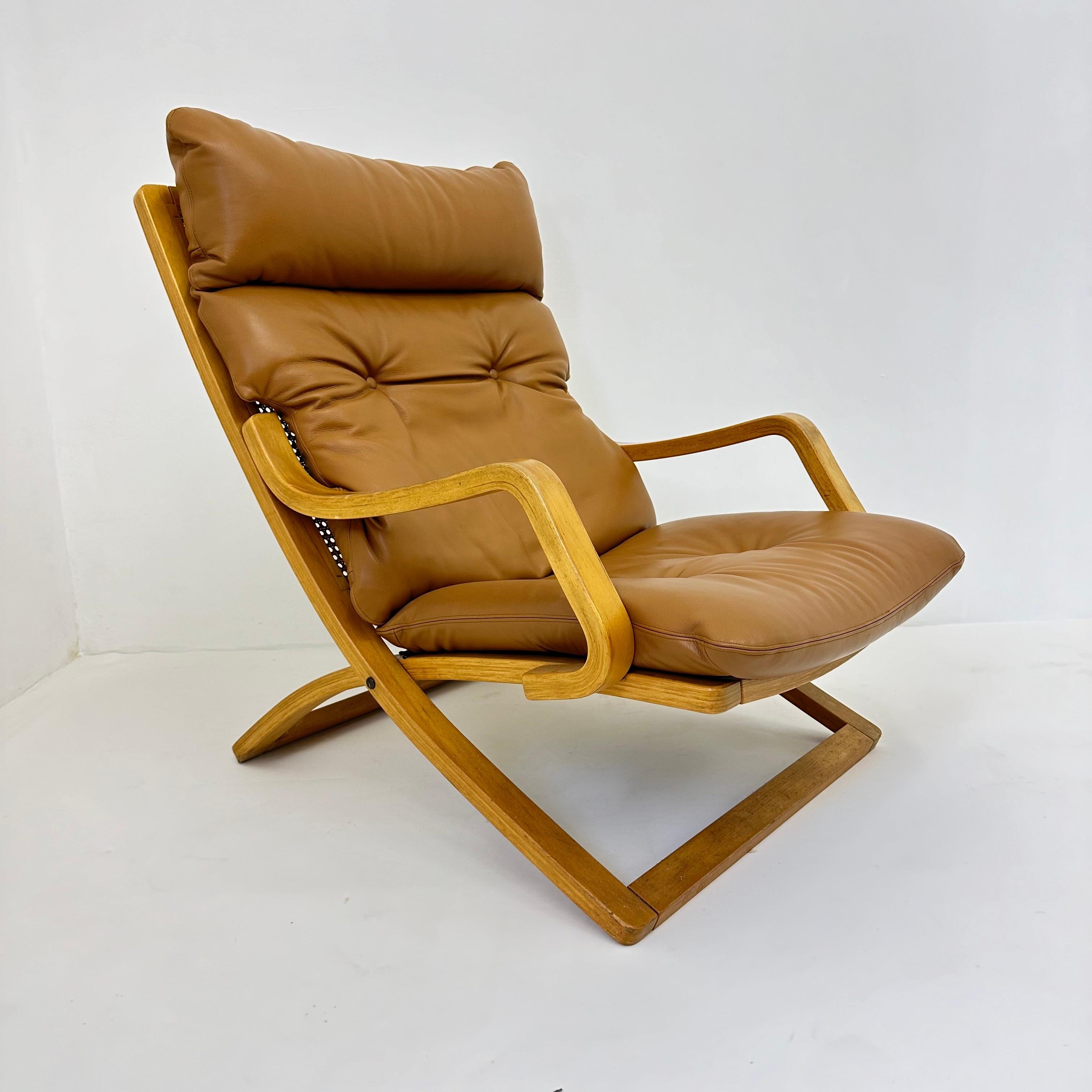Late 20th Century Vintage lounge chair cognac leather with webbing , 1970s For Sale