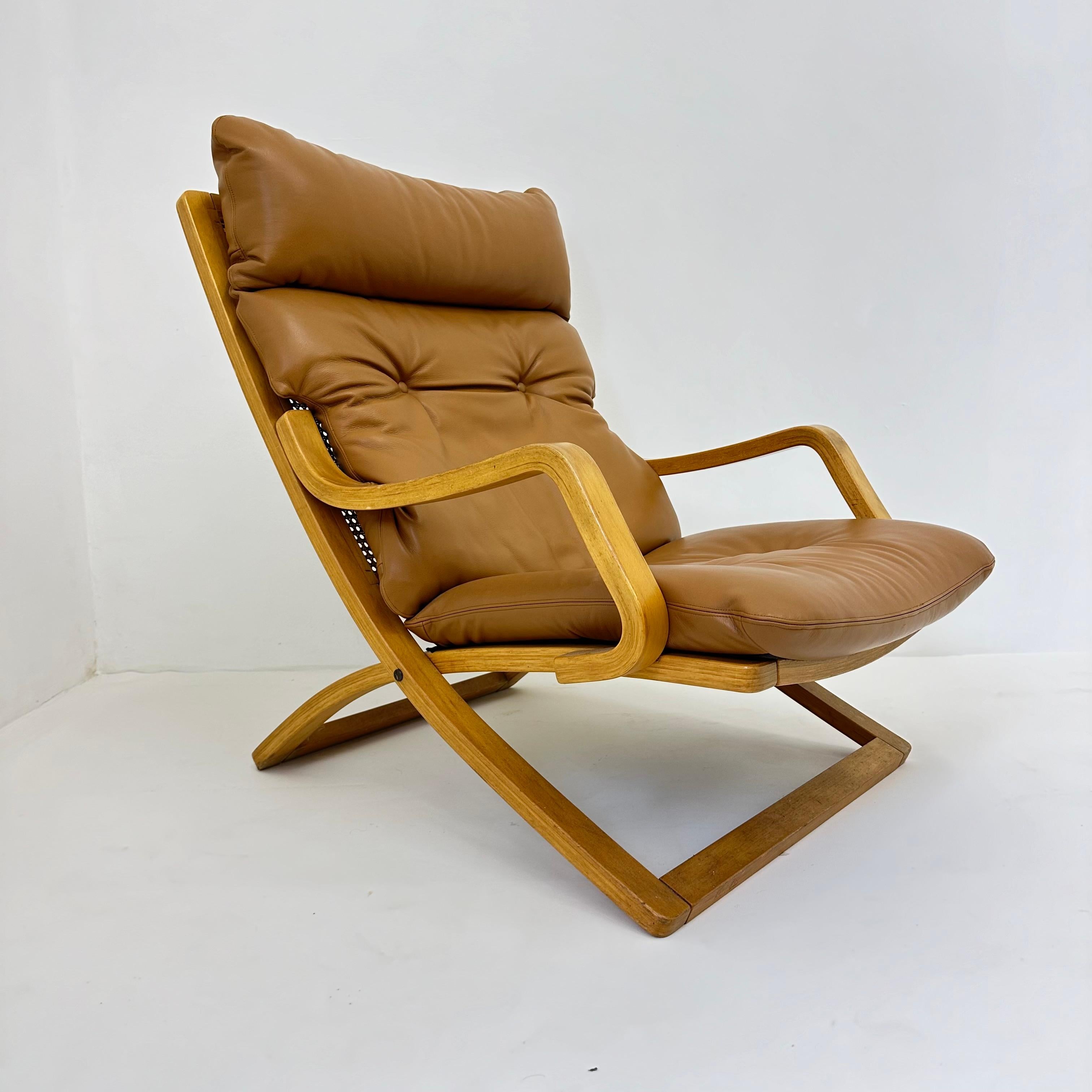 Leather Vintage lounge chair cognac leather with webbing , 1970s For Sale
