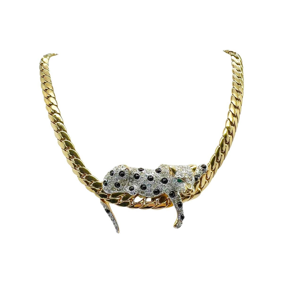A fabulous Vintage Reclining Big Cat Necklace. A leopard lounges along the chunky lustrous links of this 1980s necklace. The perfect edgy style piece.
An unsigned beauty. A rare treasure. Just because a jewel doesn’t carry a designer name, doesn’t