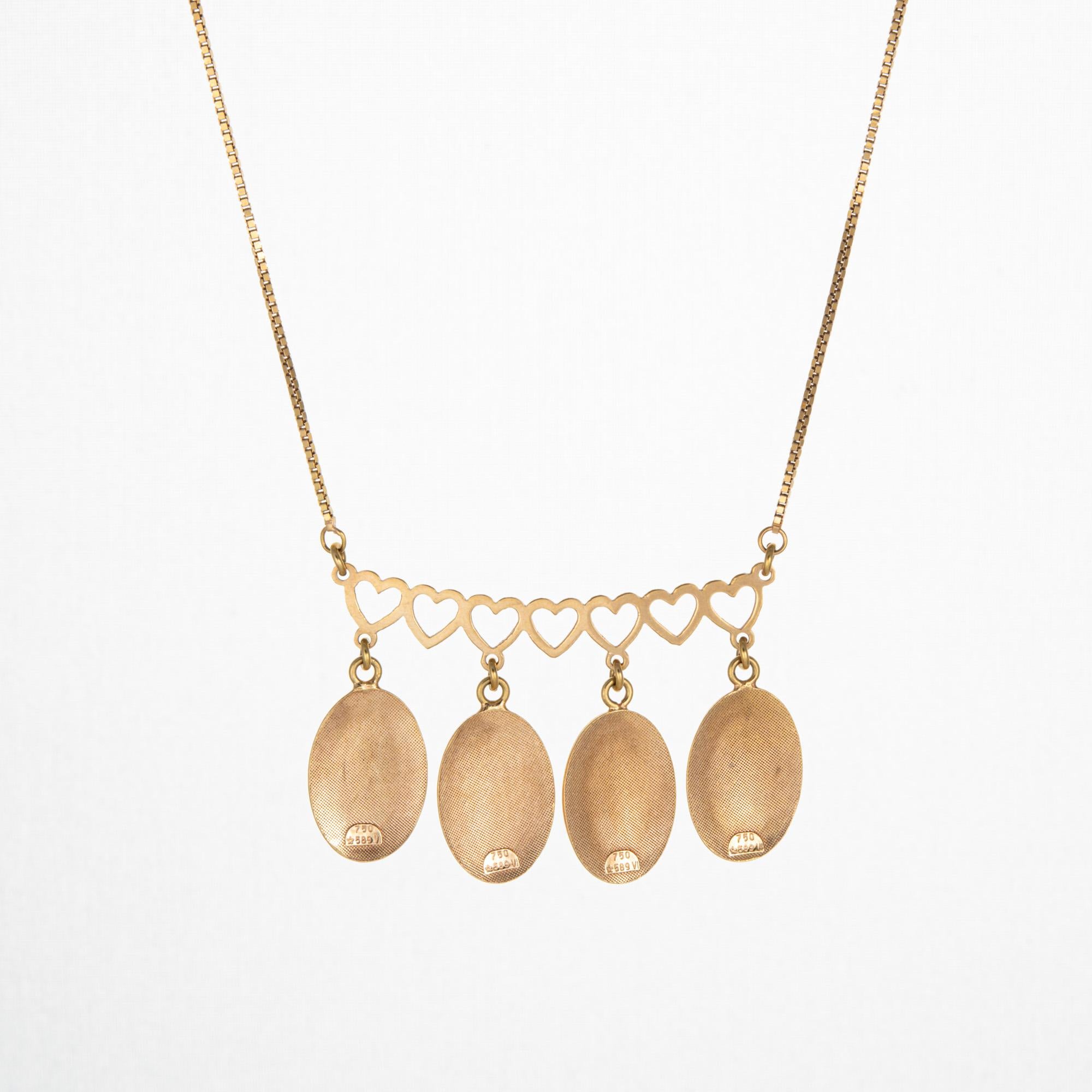 Finely detailed LOVE fringe necklace crafted in 18 karat yellow gold (circa 1970s). 

An ode to love, the charming necklace highlights four dangling medallions spelling out LOVE in retro style font, with a row of hearts to the top. Measuring 17