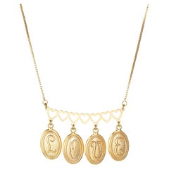 Collana Love vintage in oro giallo 18k 17" con medaglioni a frangia a forma di cuore Gioielli di pregio