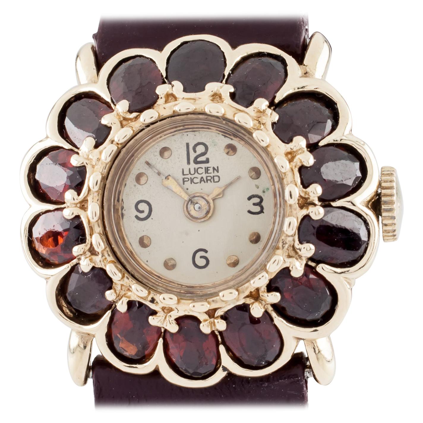 Vintage Lucien Piccard 14 Karat Gold and Garnet Flower Bezel Mechanical Watch