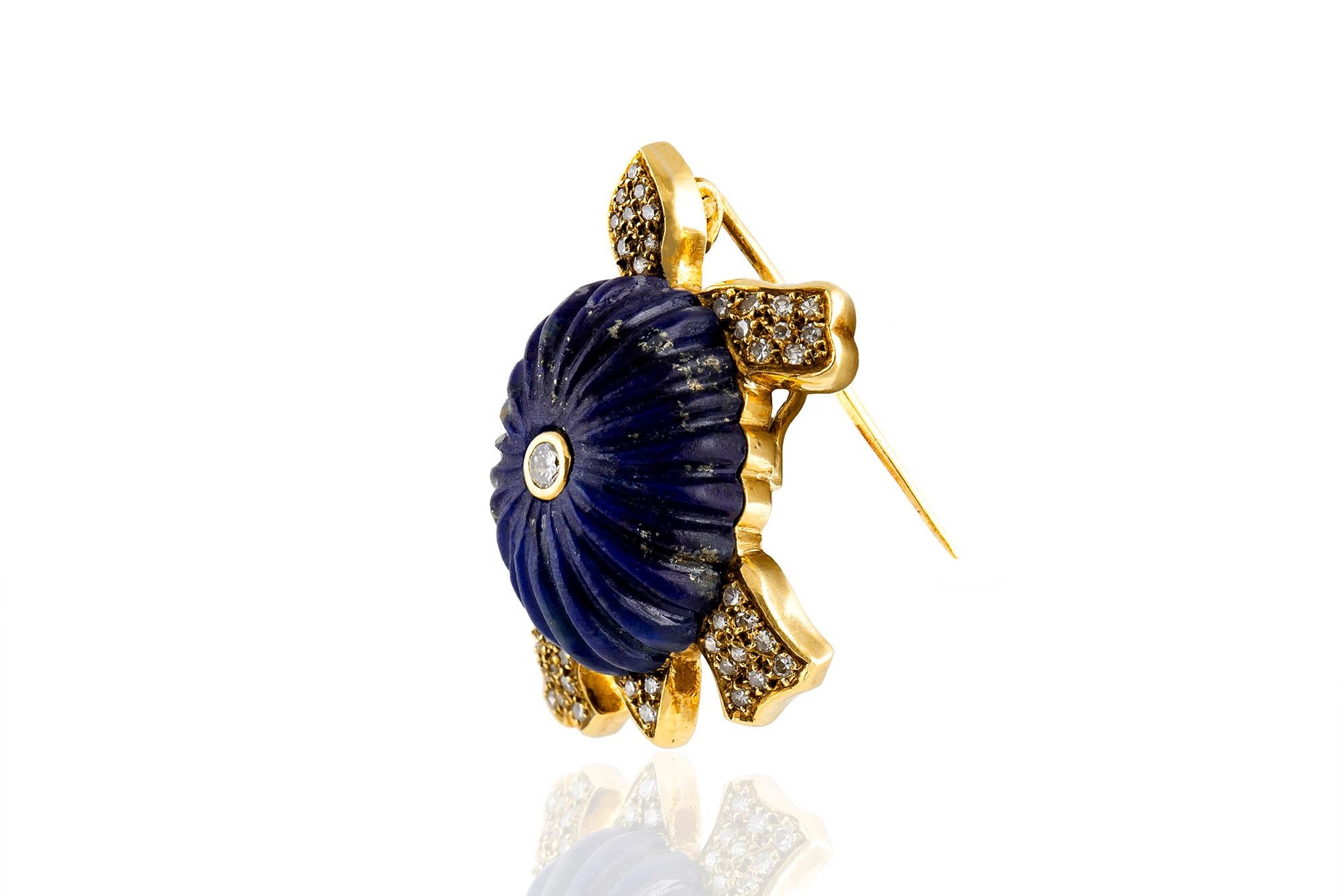 Vintage turtle brooch, finely crafted in 18 k yellow gold with Lapis Lazuli shell, all accented with brilliant-cut diamonds. 
Signed by Lucien Piccard

 
