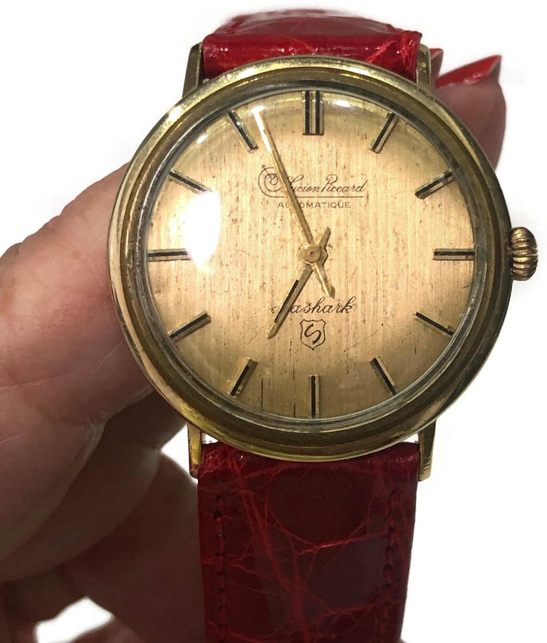 Vintage Lucien Piccard Automatic 14 Karat Gold Wrist Watch with Crocodile Band For Sale at 1stDibs