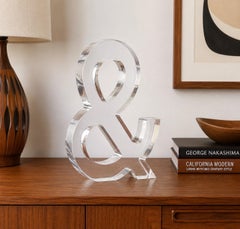Escultura vintage de «&» (ampersand) de Lucite, de alrededor de los años 70