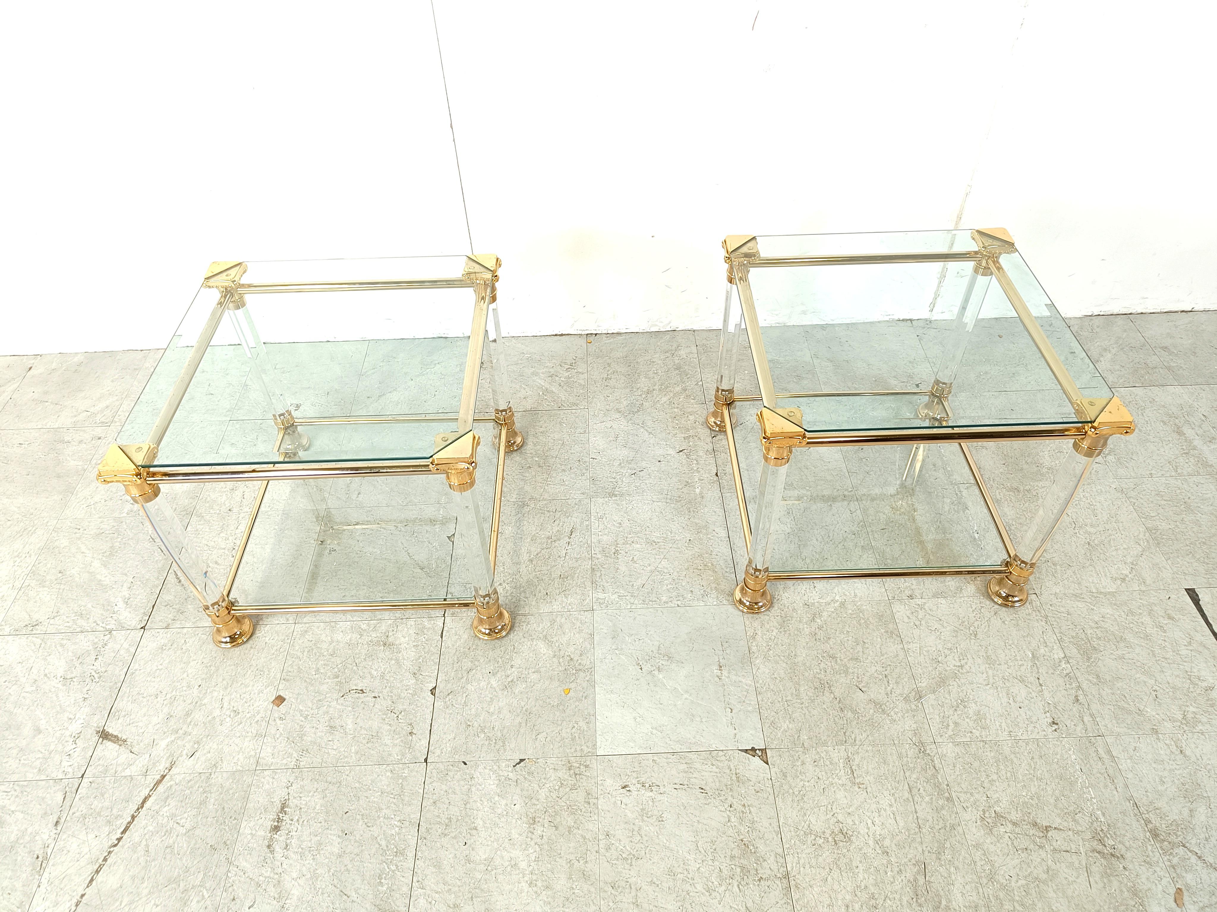 Gorgeous pair of lucite and brass column side tables with  clear glass tops.

Good overall condition.

1980s - Belgium

Dimensions:

Height: 50cm
Width: 60cm
Depth: 60cm

Ref.: 312242

*Price is for the pair 