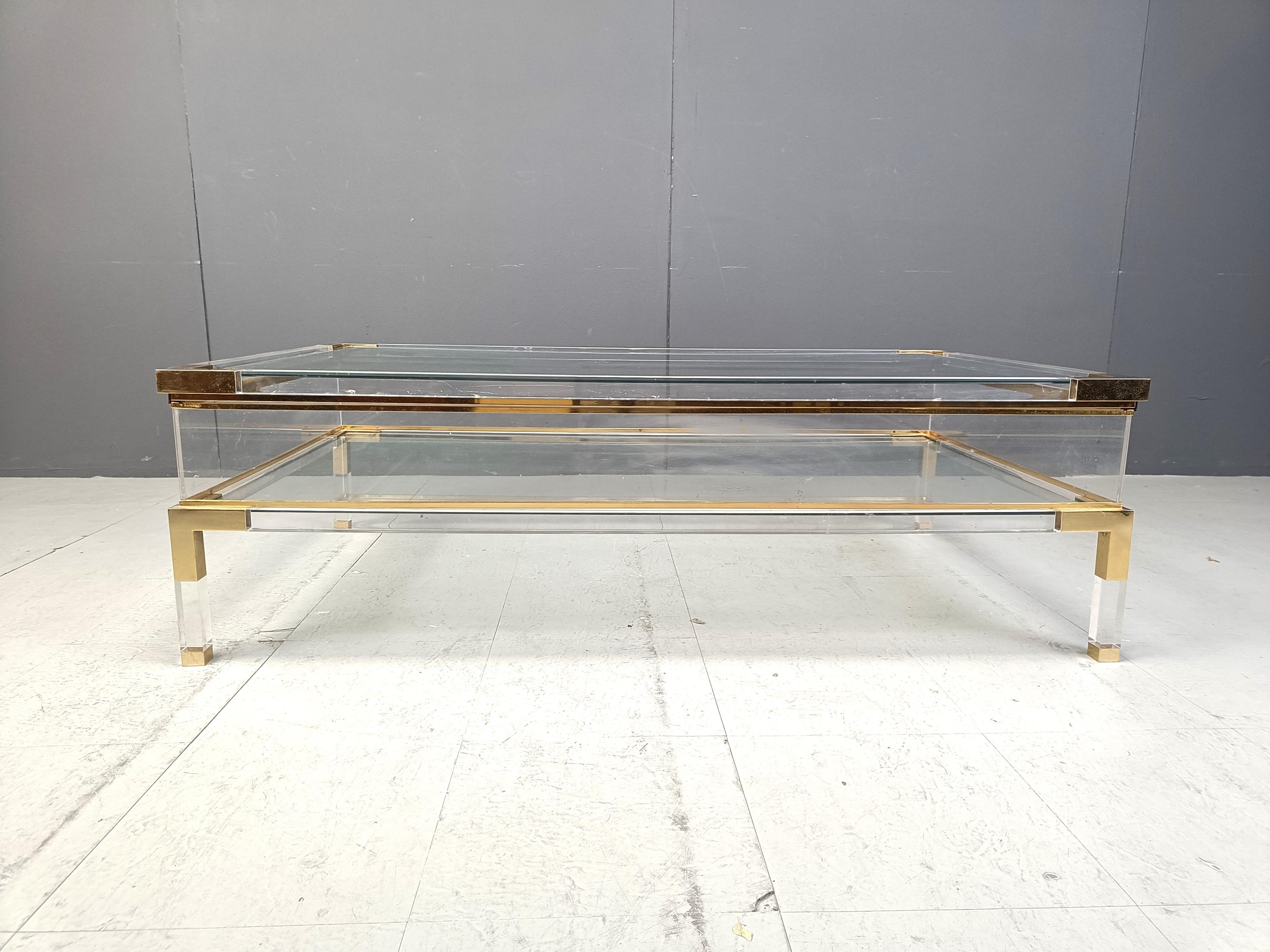 Brass Vintage lucite and brass sliding top coffee table, 1970s
