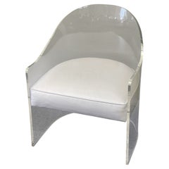 Chaise baril en lucite vintage