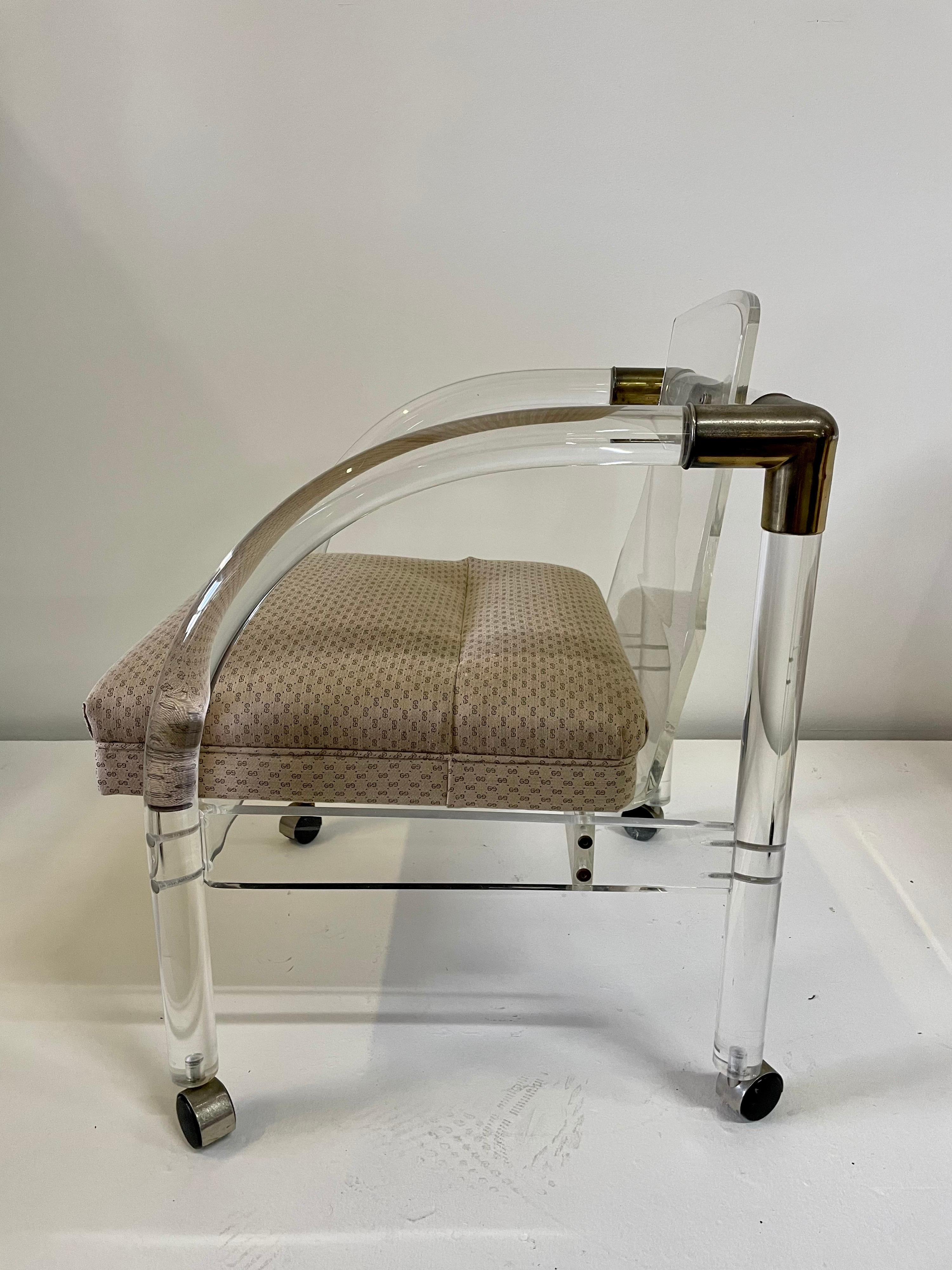 Late 20th Century Vintage Lucite Chair on Casters For Sale