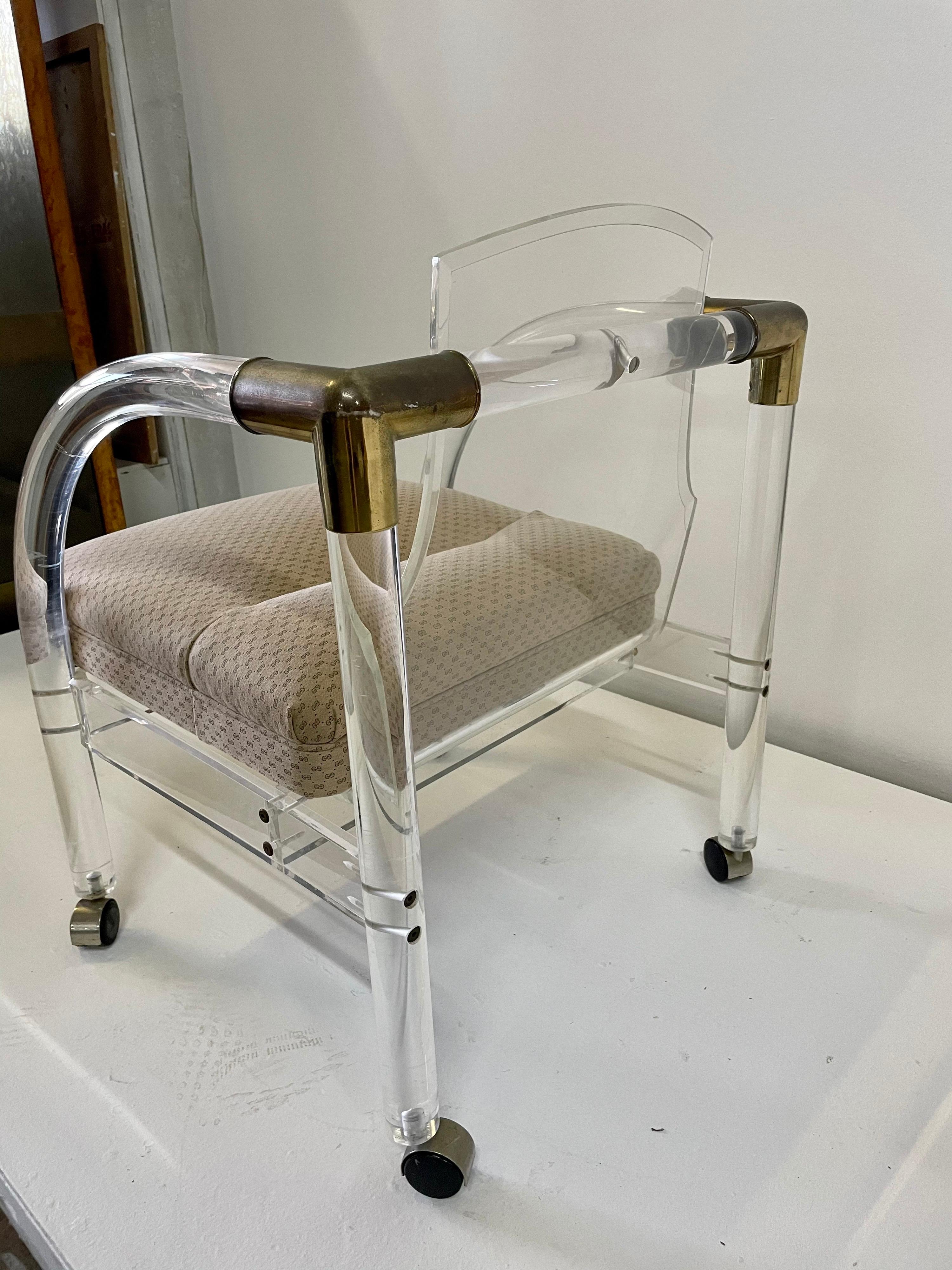 Brass Vintage Lucite Chair on Casters For Sale