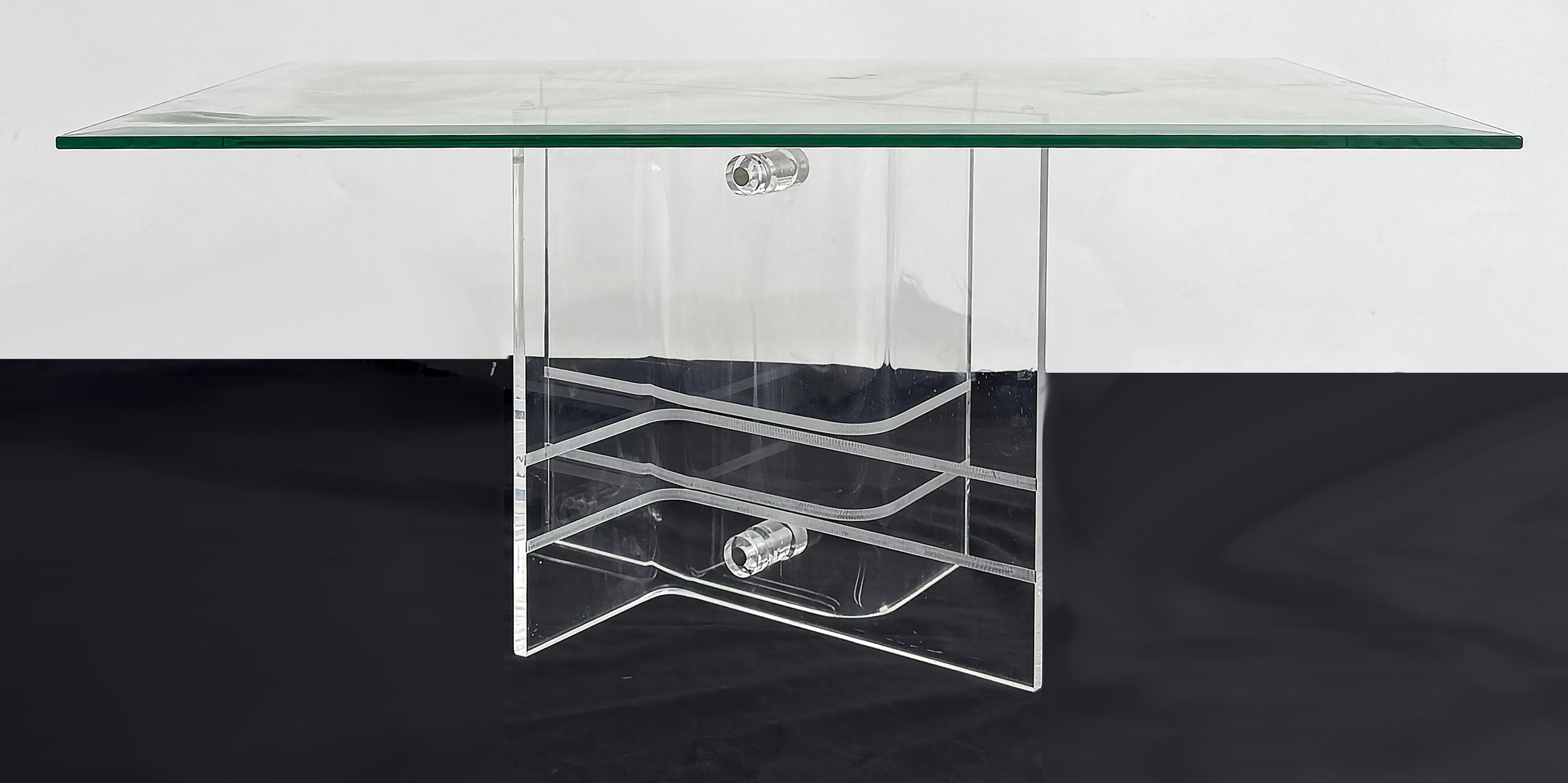 Vintage  Criss Cross Coffee Table With Glass Top, 2 Available

Offered for sale is a vintage coffee table with crisscrossed Lucite bases that are joined together and topped with a large scale glass top. The base has etched stripes and the mounting