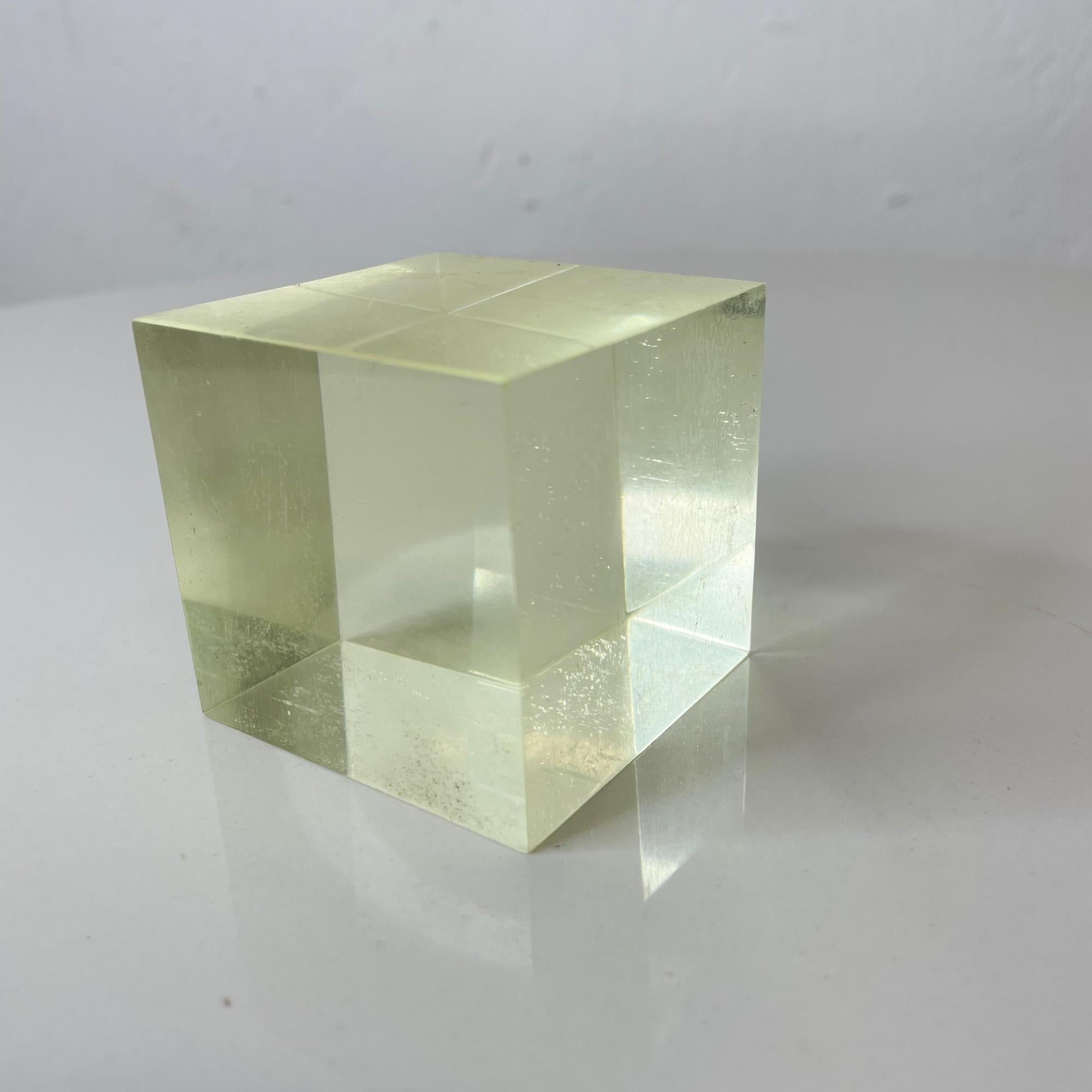 Modern vintage Lucite paperweight Cube 1970s
Geometric design styled after Team Guzzini Italy.
Unmarked.
Measures: 2.25 x 2.25 x 2.25 inches
Original unrestored vintage condition. Scuffs present.
See images please.

    