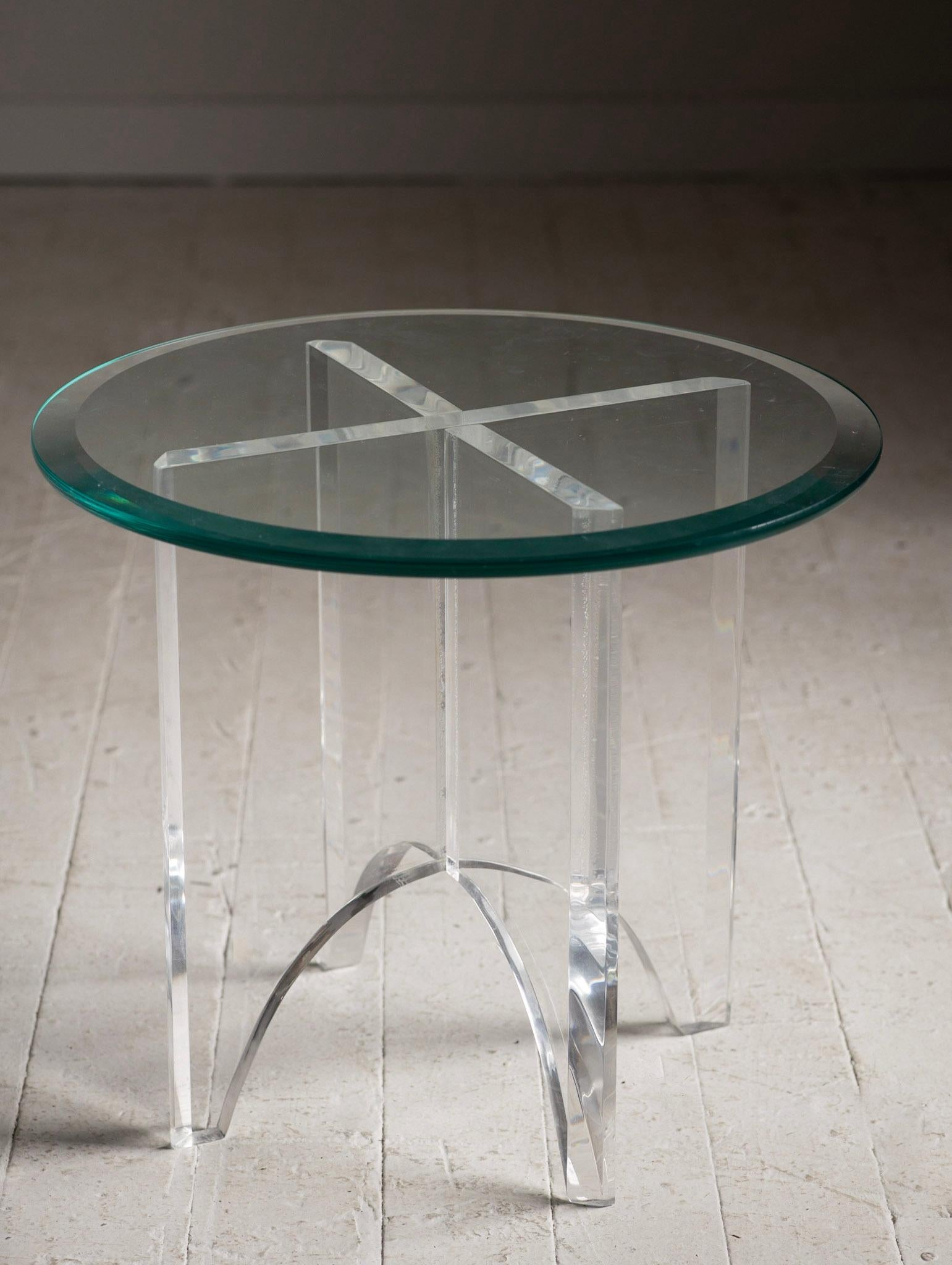 Sleek little lucite table with beveled glass top. Thick lucite 