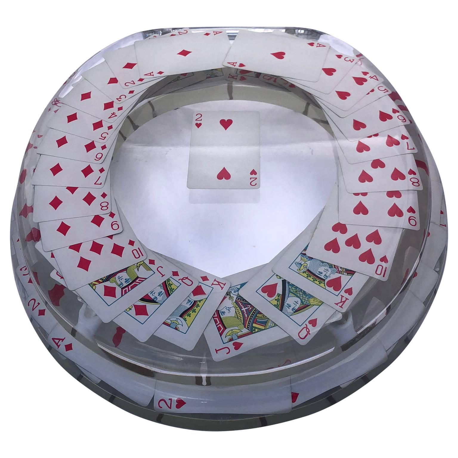 Vintage Lucite toilet seat in the red theme of deck of playing cards, hearts and diamonds.
