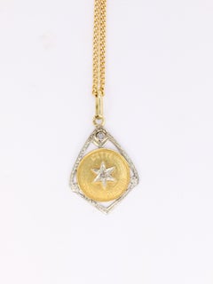 Vintage Lucky star pendant in gold and rose-cut diamonds