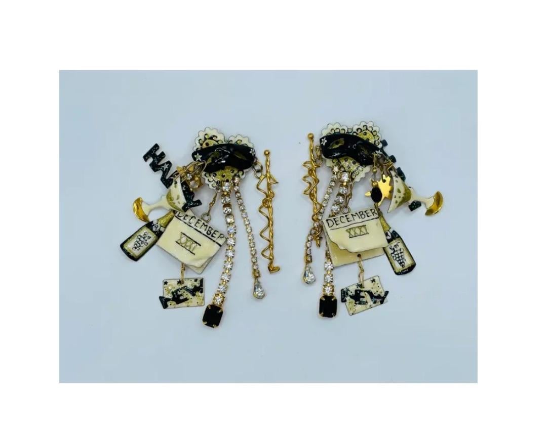 Vintage Lunch at the Ritz New Year Party Themed Earrings

in great condition needs some light cleaning which we will gladly do if you request us to do it

Due to the item's age do not expect items to be in perfect condition and I may not describe