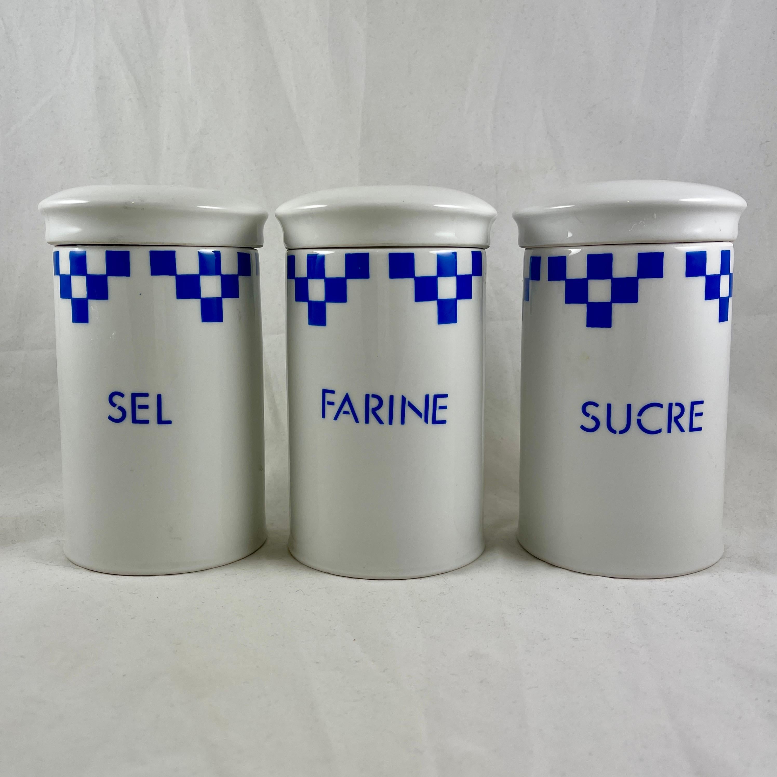 A group of three French blue and white ceramic kitchen canisters, in the ‘Lustucru Blu’ Checkered pattern, circa 1950s.

Lustucru has been a well known French brand of food and kitchen accessories since 1911. Their products are widely recognized