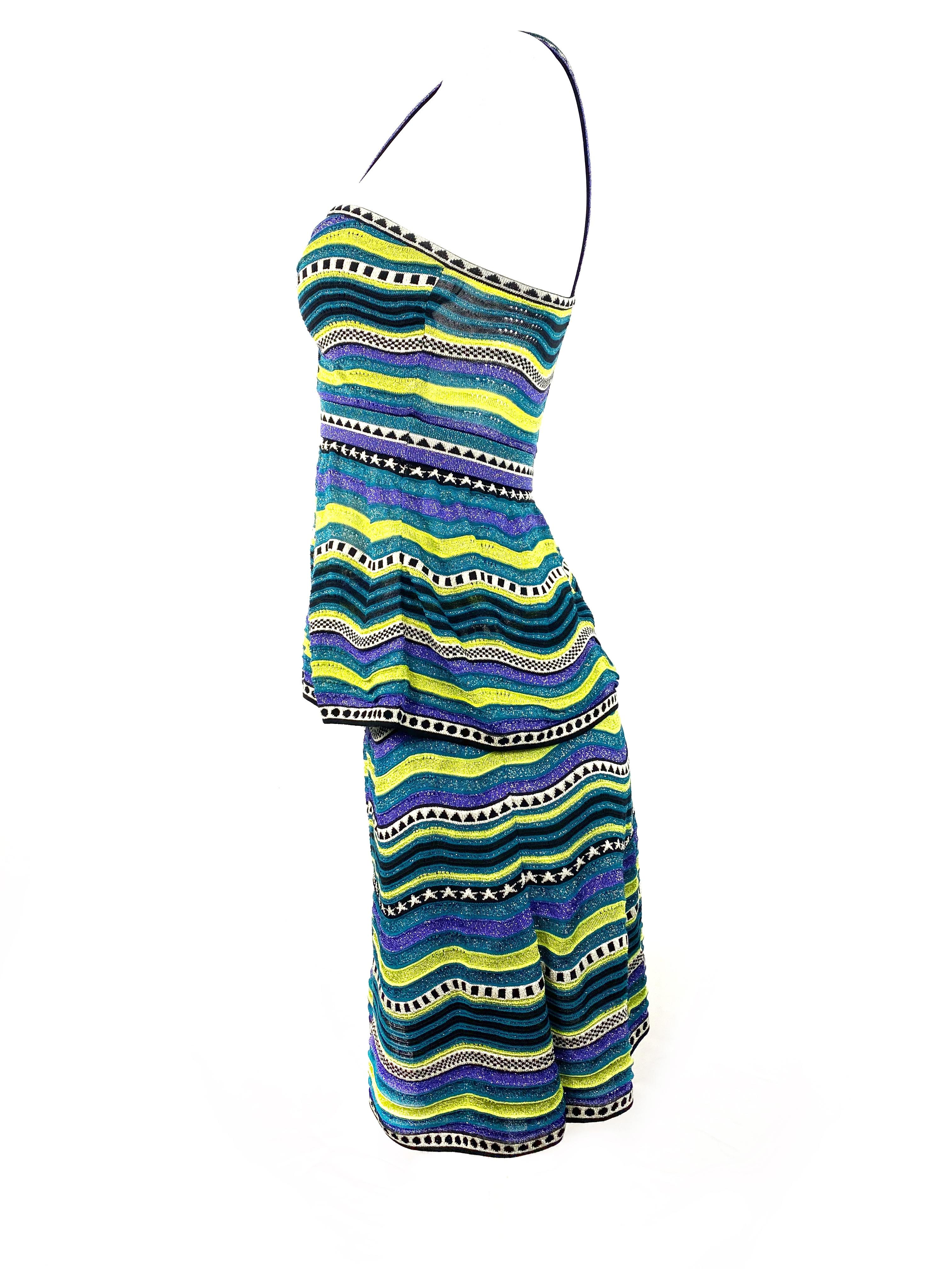 Vintage M MIssoni Multicolor Striped Knit Top and Skirt Set

Product details:
Featuring blue, green, black and white striped pattern with metallic detail. 
Sleeveless top is size 40. Length is 24