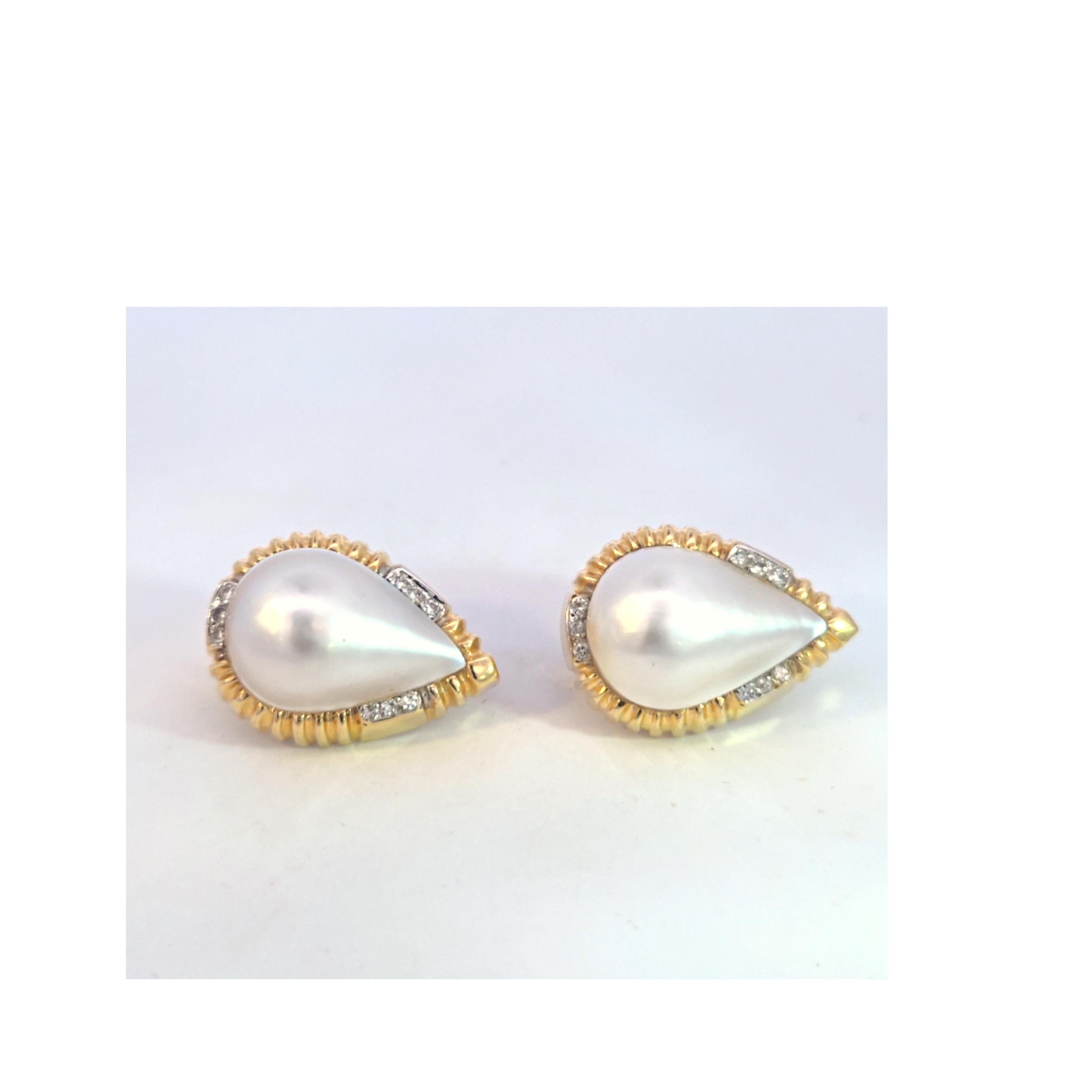These beauties are secured with a pierced/clip clasp for extra security.  The mabe' pearls measure approximately 15.00 mm x 20.00 mm and the earrings also have accent diamonds.