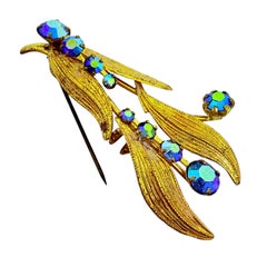 Vintage MADE IN AUSTRIA signed gold tone aurora rhinestone brooch