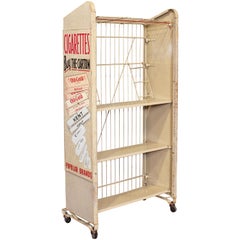 Used Magazine Rolling Rack Newspaper Stand with Tobacco Advertisement