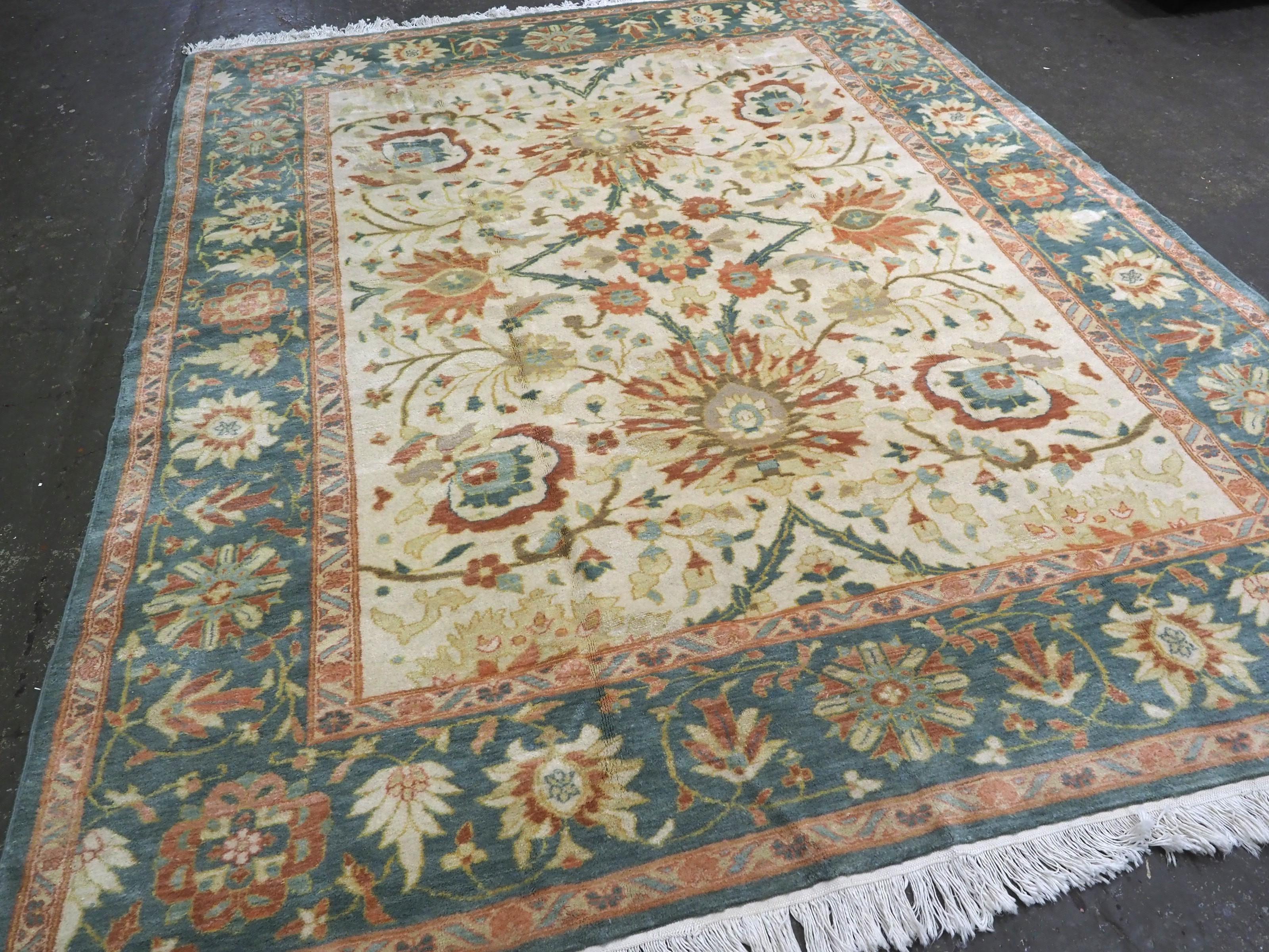
Vintage Mahal style carpet with all over large scale design on an ivory ground.

About 40-50 years old.

The carpet is very striking with a large scale design and soft pastel colours on a cream / ivory coloured field. The carpet has the look that