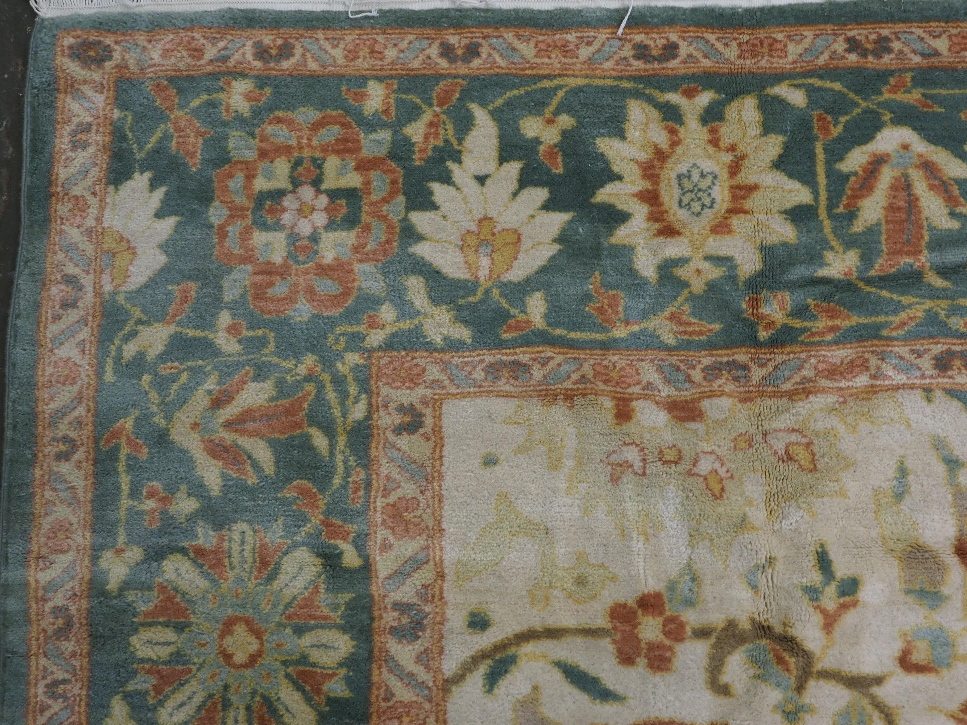 Wool Vintage Mahal style carpet with all over large scale design on an ivory ground. For Sale
