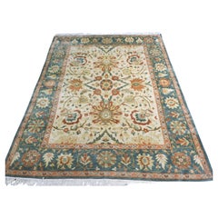 Vintage Mahal style carpet with all over large scale design on an ivory ground.