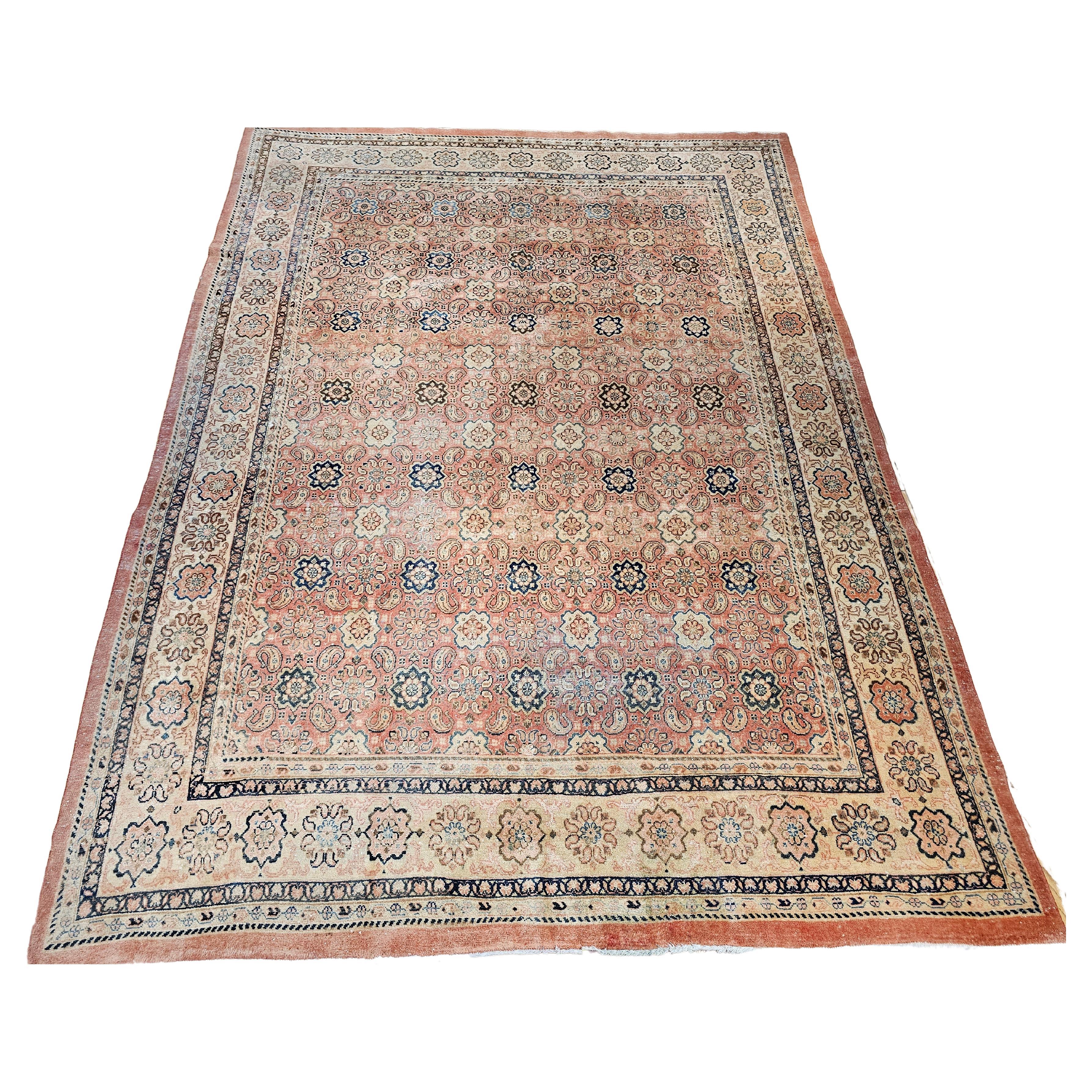  A wonderful vintage Persian Mahal Sultanabad rug with a unique all over geometric pattern  set in a pink to pale pink field color with small medallions and paisley forms throughout.   The small medallions have abrash colors of navy blue to pale