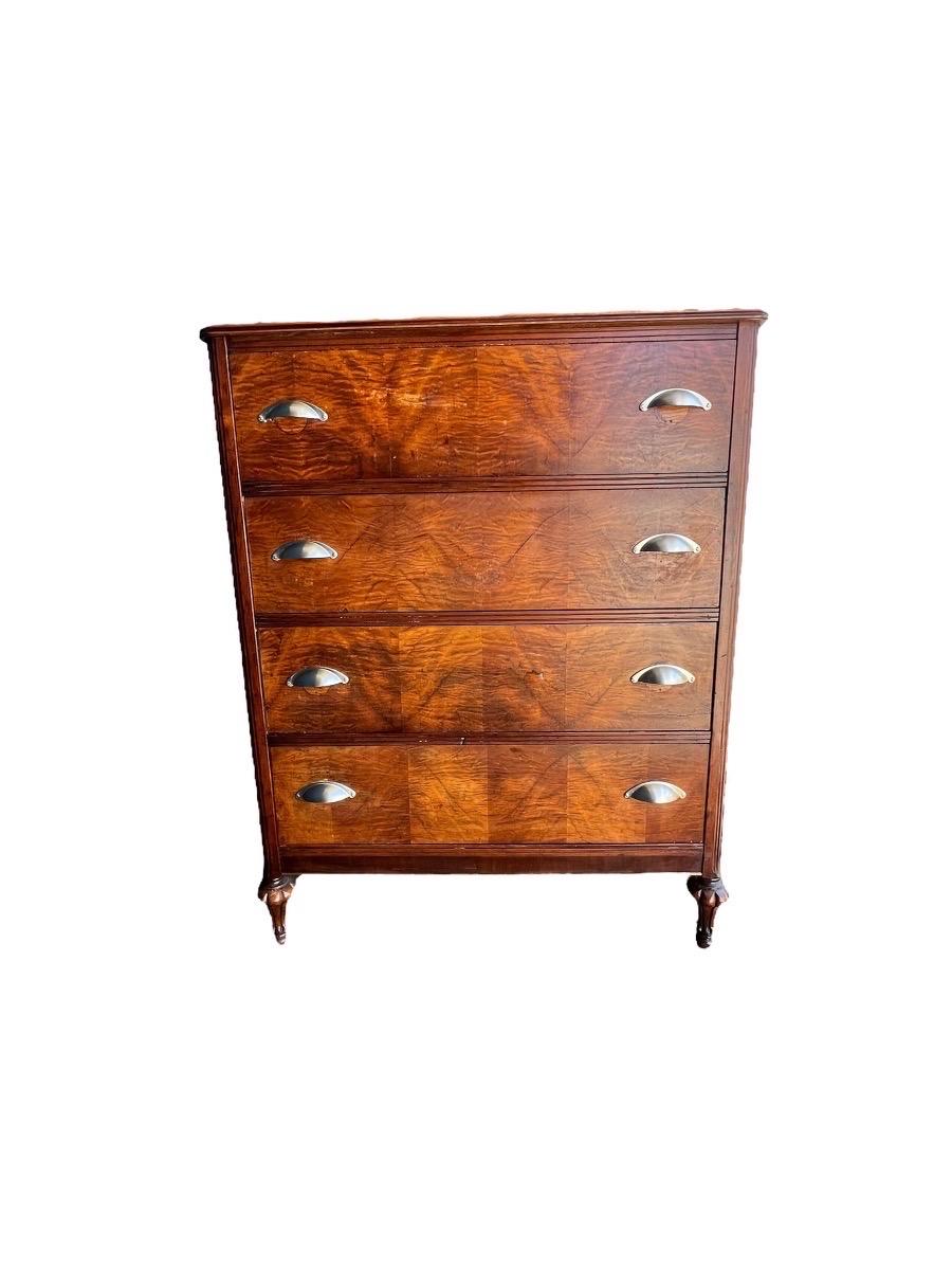 Vintage mahogany and burl wood veneer dresser cabinet storage drawers.
Dimensions. 33 W ; 42 1/2 H ; 19 D.