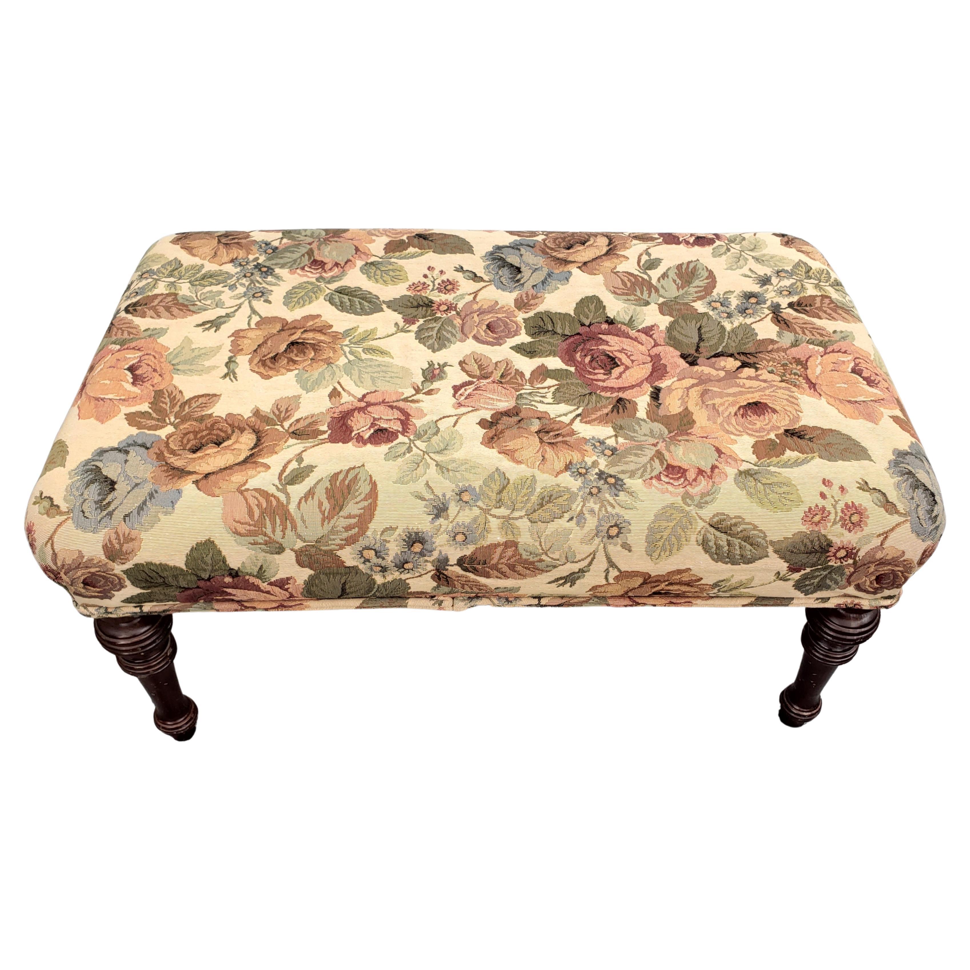 Vintage Mahogany and French floral tapestry bench ottoman stool.
Turned mahogany legs. French tapestry upholstery with flower pattern. 
Good vintage condition
Measures 32