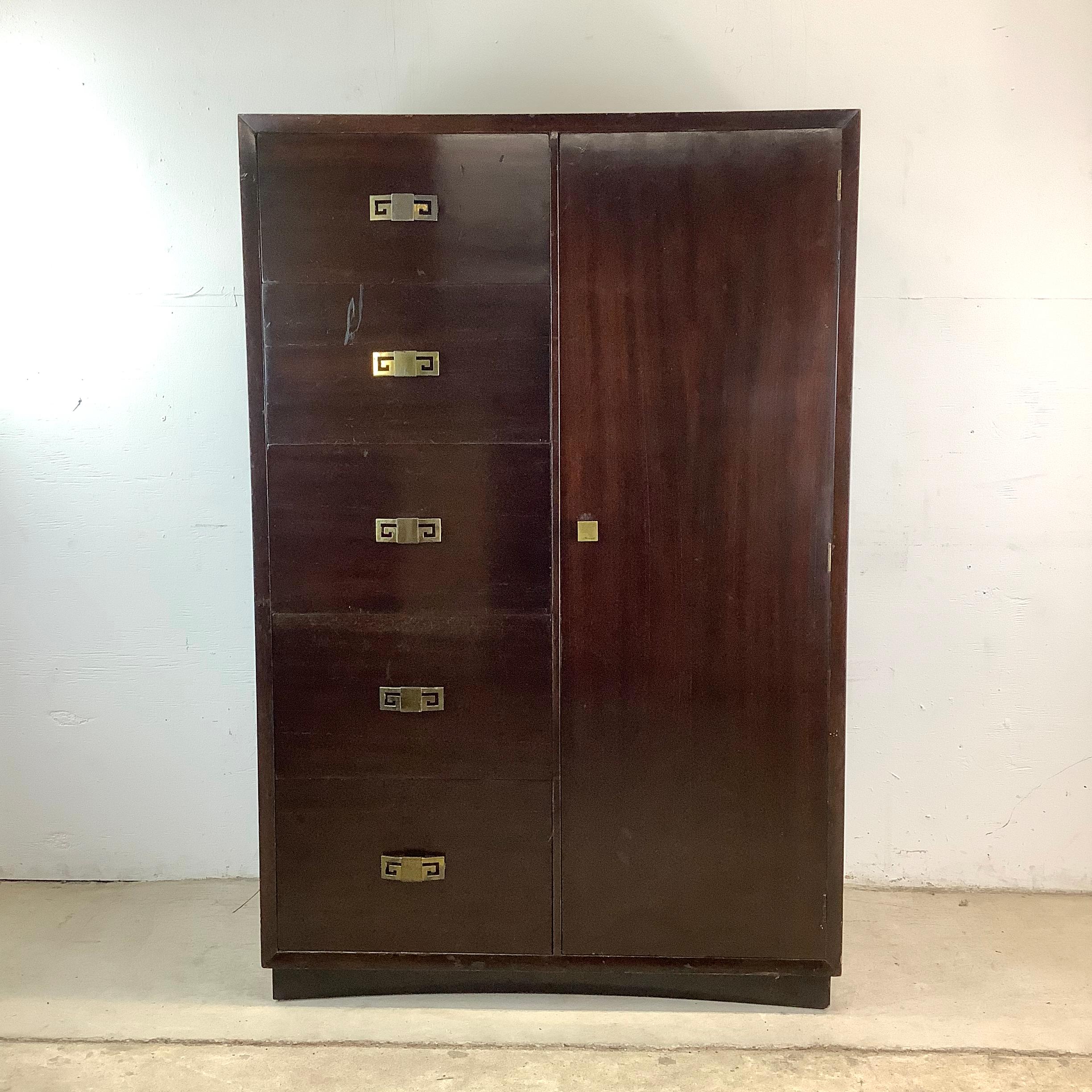 Vintage style meets practical elegance in this mid-century Art Deco style wardrobe armoire. Crafted with a beautiful mahogany finish, this piece blends the richness of early 20th century design with the practicality of modern storage needs.

The