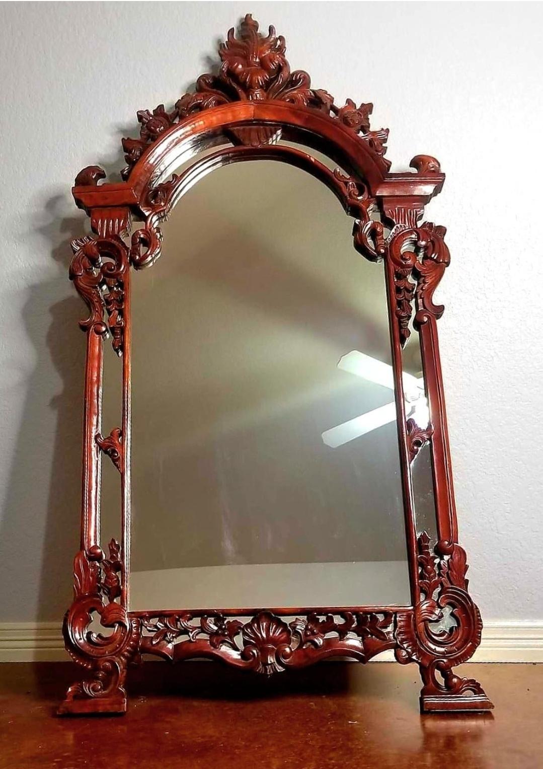 Handmade in Indonesia.
Elegantly handcarved ornanate mahogany.
Footed floor leaner or wall mirror.
Brings character to any room.
Chinoiserie. 
Chippendale. 
Gothic. 