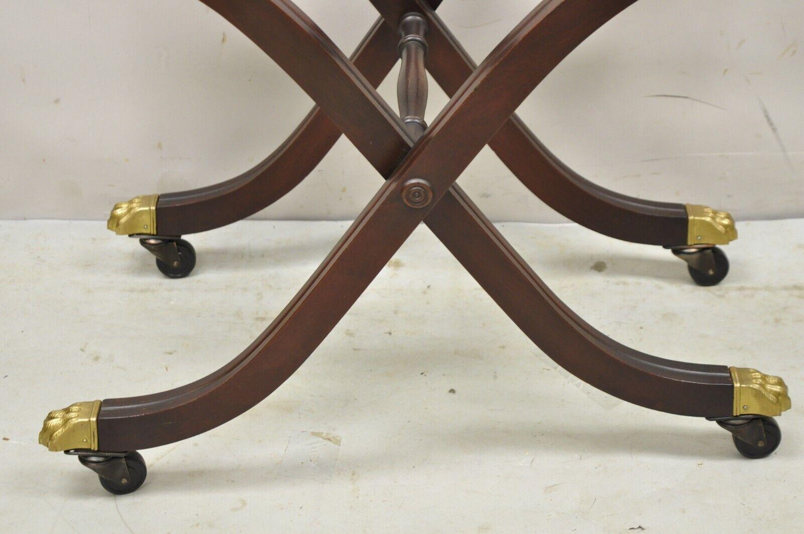 Vintage Mahogany Folding Luggage Rack Stand Rolling Brass Claw Feet Empire Style In Good Condition In Philadelphia, PA