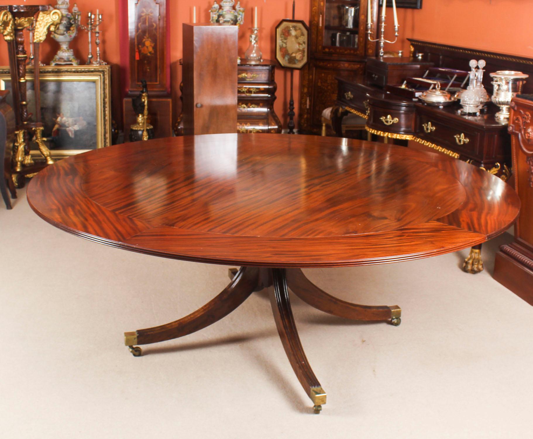 This beautiful dining set comprises a Regency Revival Jupe style dining table mid 20th Century in date, with the matching set of eight bespoke Regency style dining chairs.

The table has a solid mahogany top with a reeded edge that has five