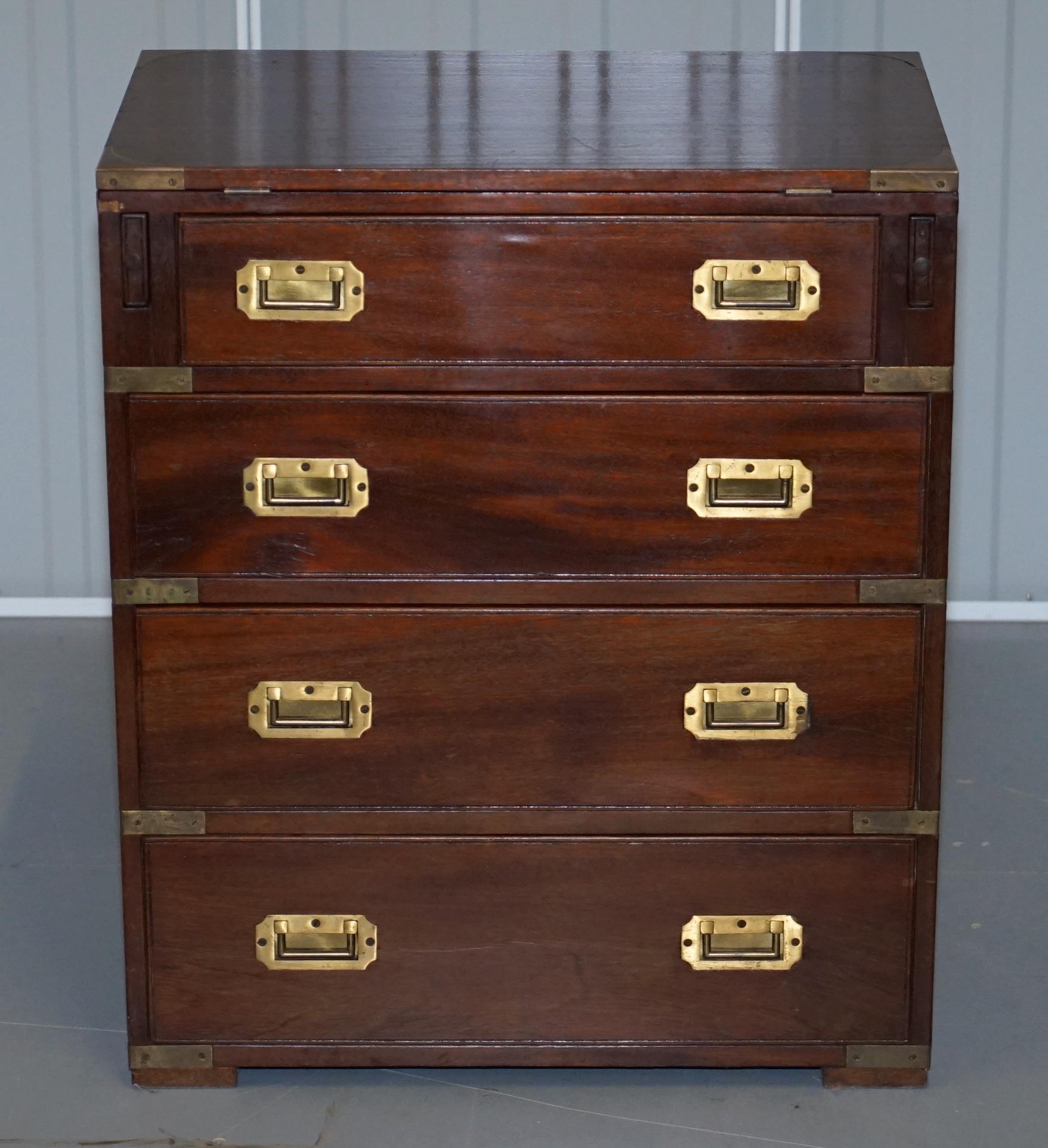 We are delighted to offer for sale this lovely vintage Military Campaign chest of drawers with folding butlers serving tray in mahogany

A well made and versatile chest, it’s a large side table size and has a butlers serving tray which unfolds.
