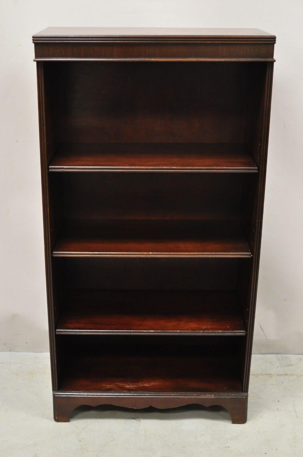Vintage Mahogany Sheraton Style Open 3 Shelf Bookcase Bookshelf Stand. Item features beautiful wood grain, 3 adjustable shelves, very nice vintage item, quality American craftsmanship, great style and form. Circa Early to Mid 20th Century.