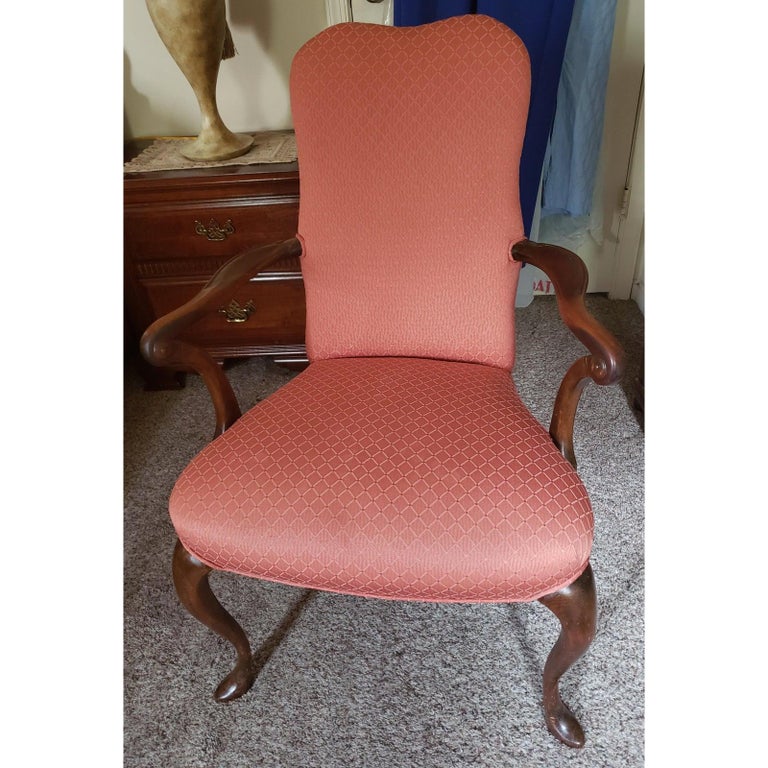 Vintage Solid mahogany upholstered arm chair. Apricot like fabric color in good condition.
This Vintage chair from 1970s measures 26 w x 24D x 41H.
