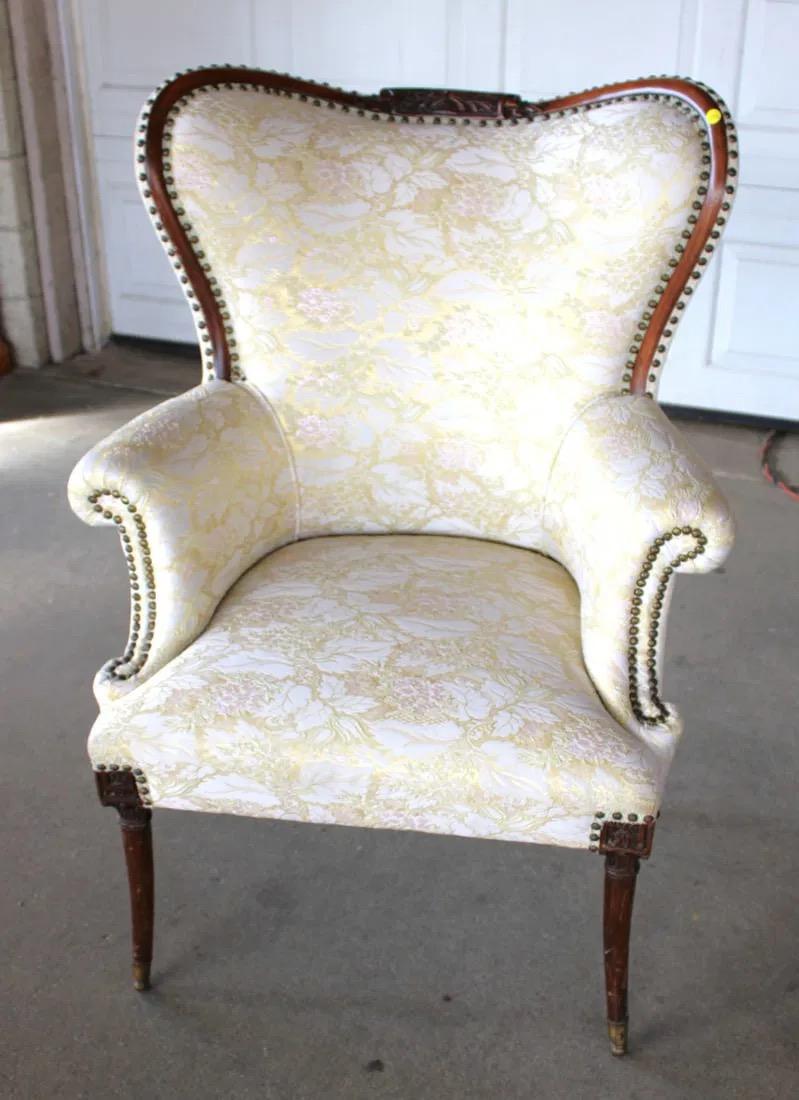 Mid-Century Modern Vintage Mahogany Wingback Chair With Carved Detailing For Sale